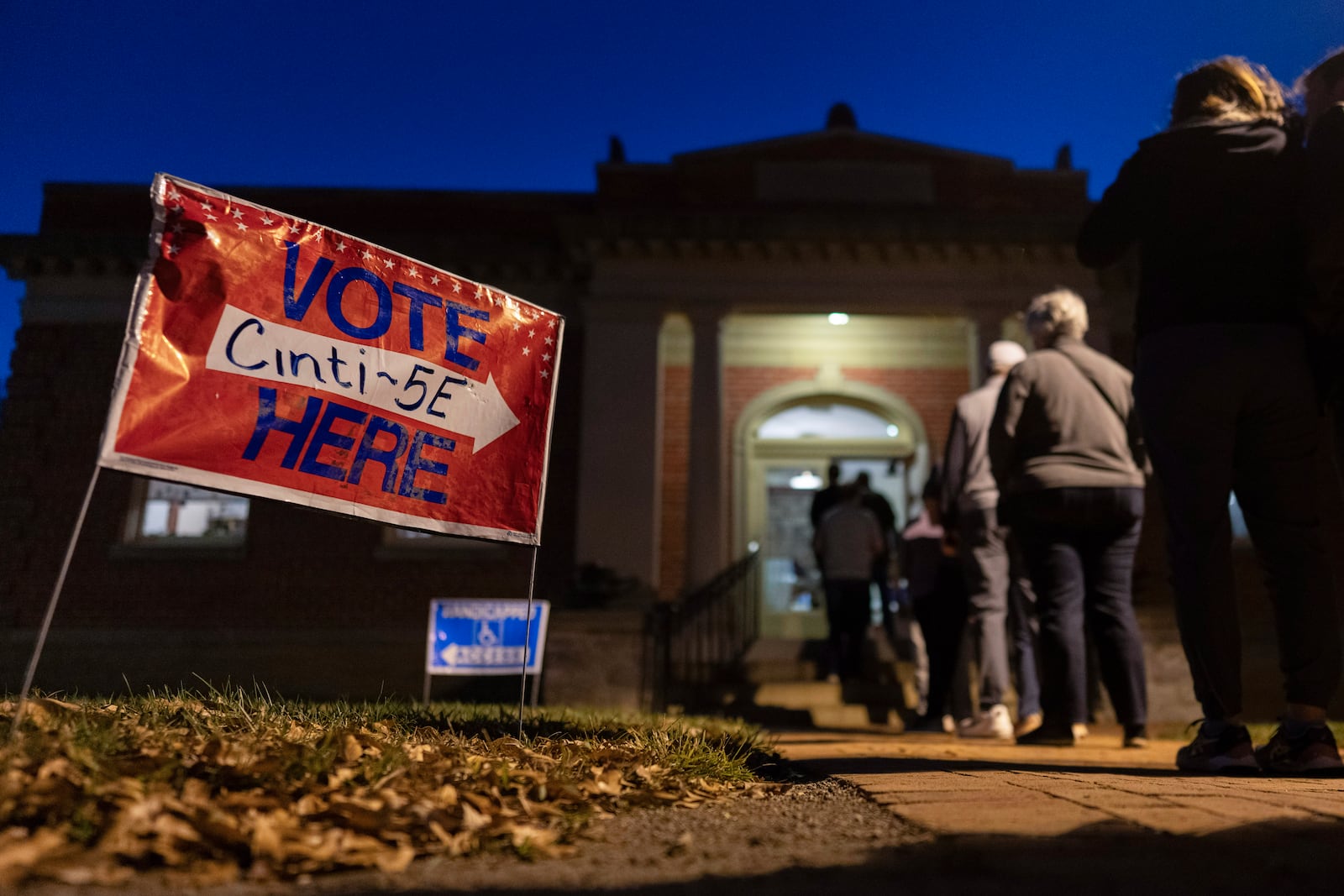 Voters line up to enter their polling place at the Cincinnati Observatory on election day, Tuesday, Nov. 5, 2024, in Cincinnati. (AP Photo/Carolyn Kaster)