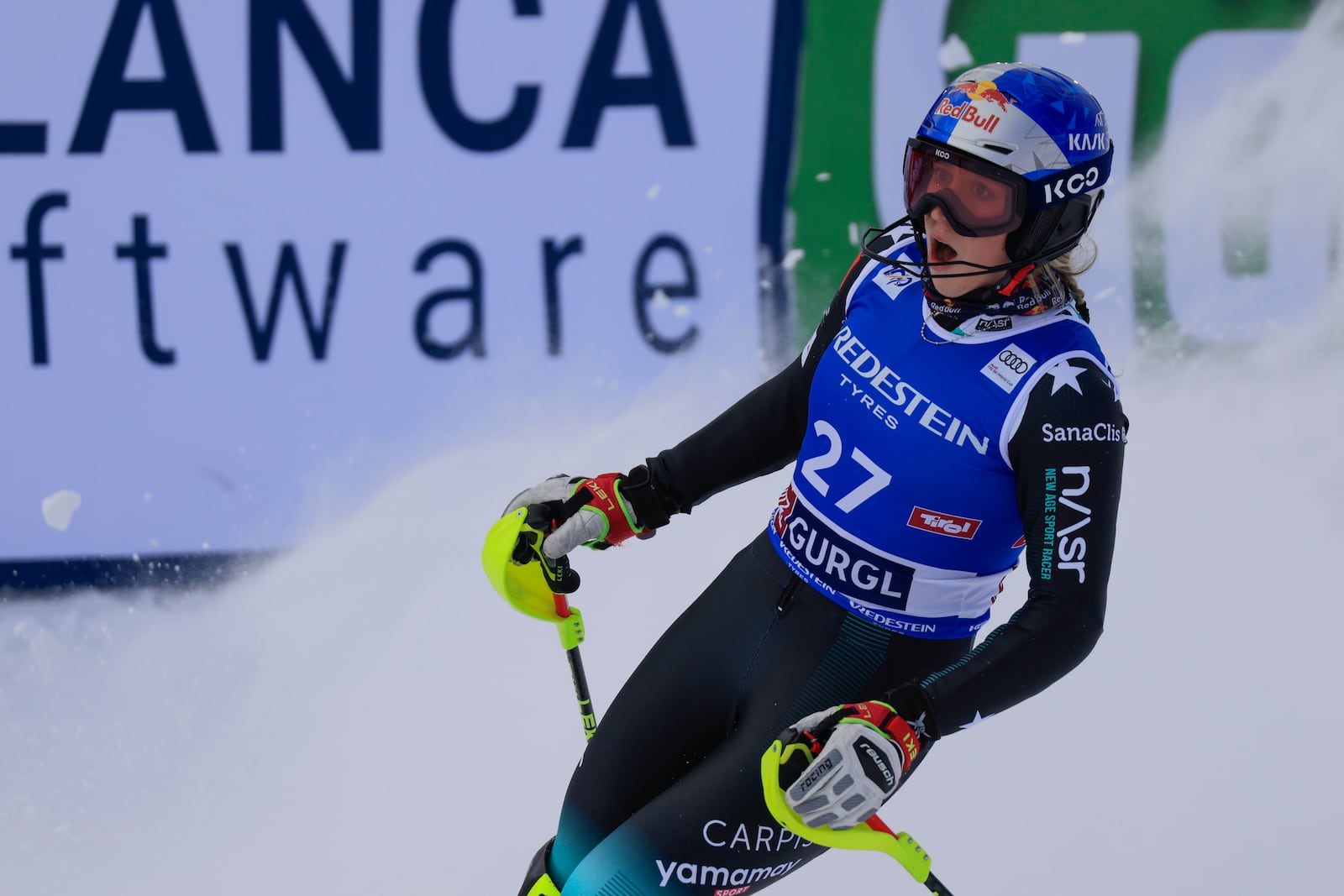 Albania's Lara Colturi celebrates at the finish area of an alpine ski, women's World Cup slalom, in Gurgl, Austria, Saturday, Nov. 23, 2024. (AP Photo/Giovanni Maria Pizzato)