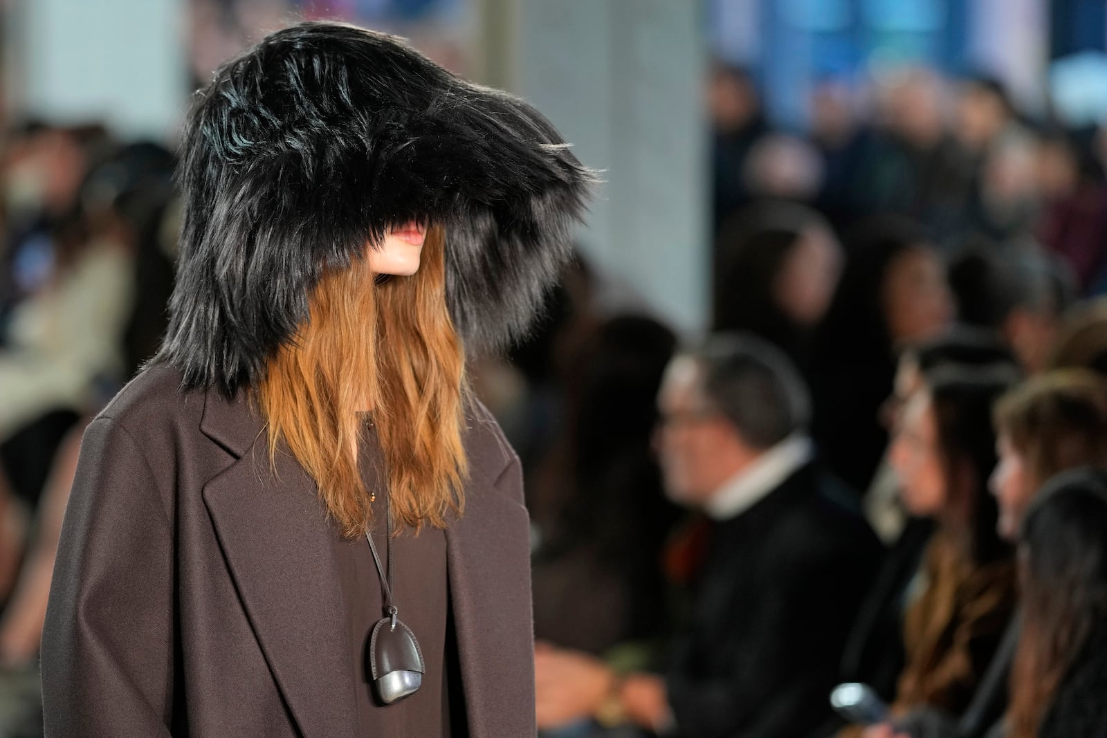 A model walks the runway during the Michael Kors Fall/Winter 2025 fashion show as part of New York Fashion Week on Tuesday, Feb. 11, 2025, at Terminal Warehouse in New York. (Photo by Charles Sykes/Invision/AP)