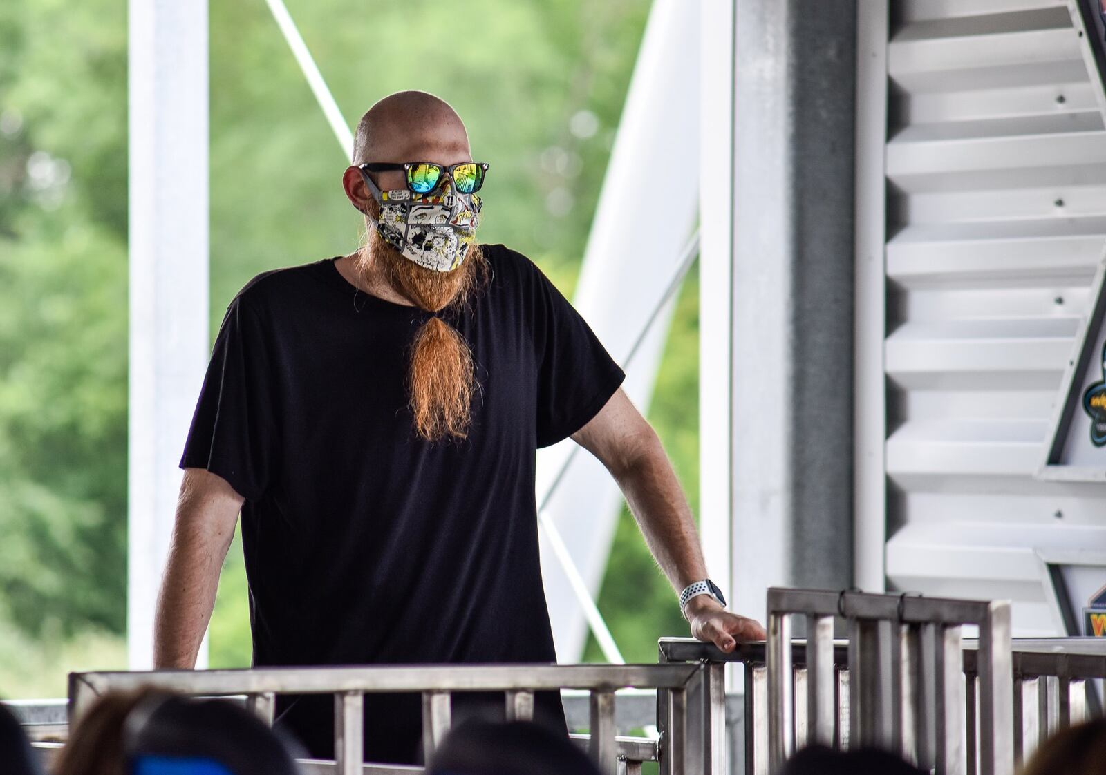 Coaster enthusiast Jared Ream waits to ride the new Orion giga coaster in the background on media day Wednesday, July 1, 2020, at Kings Island in Mason. NICK GRAHAM / STAFF