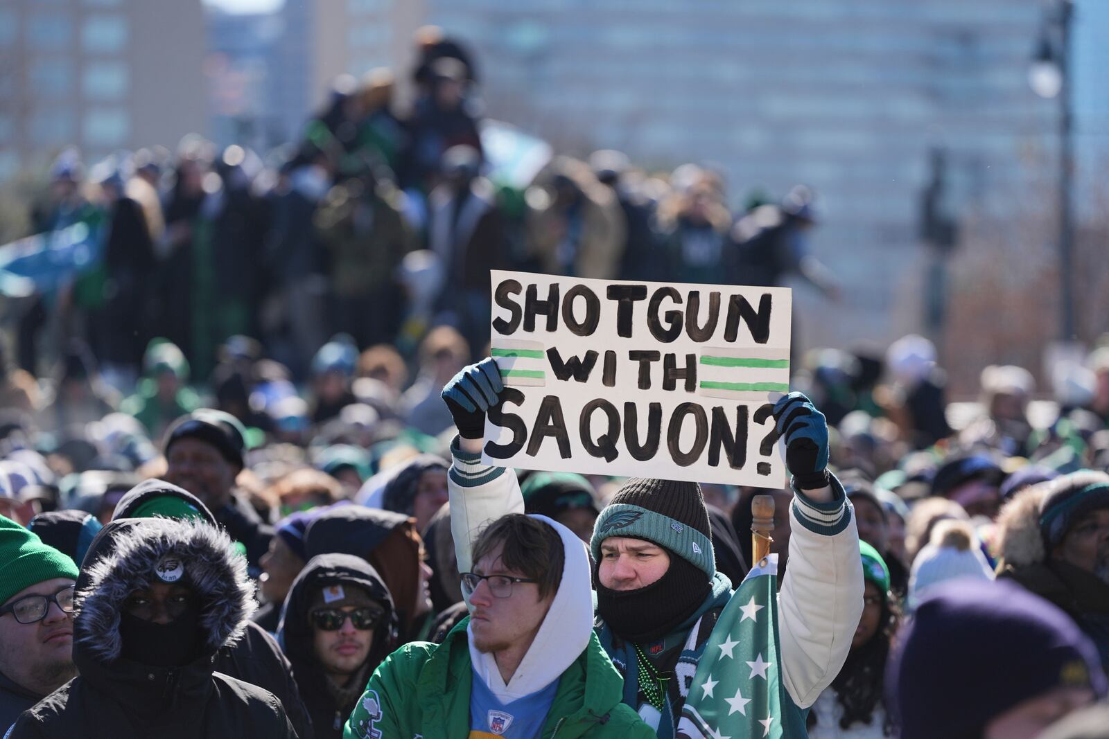 A Philadelphia Eagles holds up a sign during the Eagles' NFL football Super Bowl 59 parade and celebration, Friday, Feb. 14, 2025, in Philadelphia. (AP Photo/Matt Rourke)