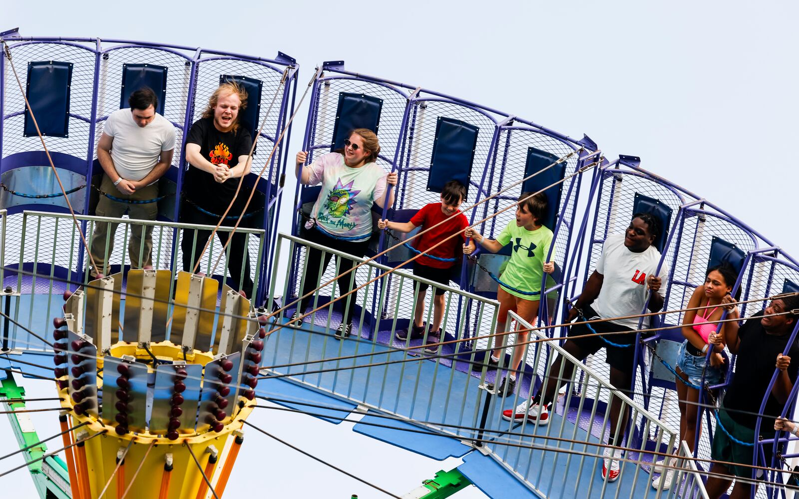 Fair attendees enjoy rides at Butler County Fair Tuesday, July 25, 2023 in Hamilton. NICK GRAHAM/STAFF