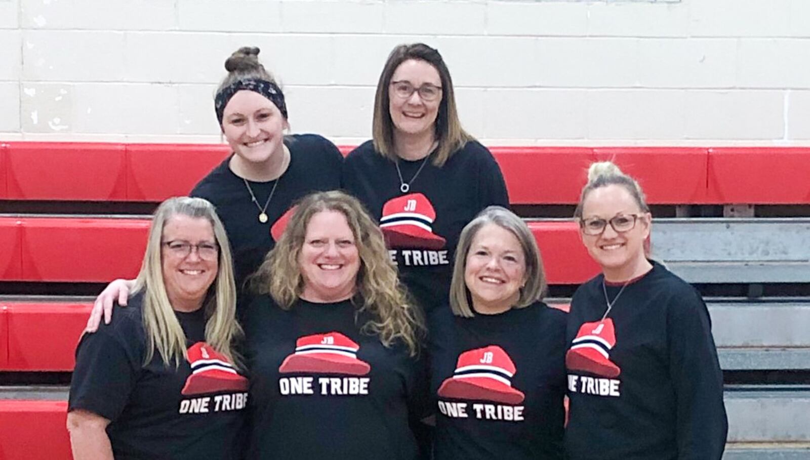 Crossroads school staff are pictured in the "Super Fan Jim" shirts are Debbie McCune, school nurse; Jen Crawley, EL teacher; Shannon Cupp, assistant principal; Francine Ross, secretary; Shannon Jarvis, educational assistant, and Jenni Meier, physical education teacher. CONTRIBUTED