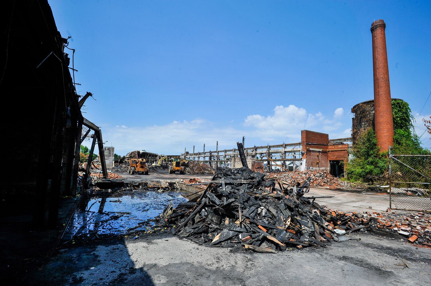 Crews demolish warehouse after massive fire in Hamilton