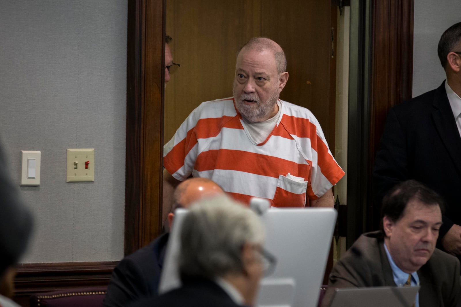 Greg McMichael enters the courtroom before a hearing challenging his conviction of killing Ahmaud Arbery in 2020, Thursday, Oct. 24, 2024, in Brunswick, Ga. (AP Photo/Stephen B. Morton)