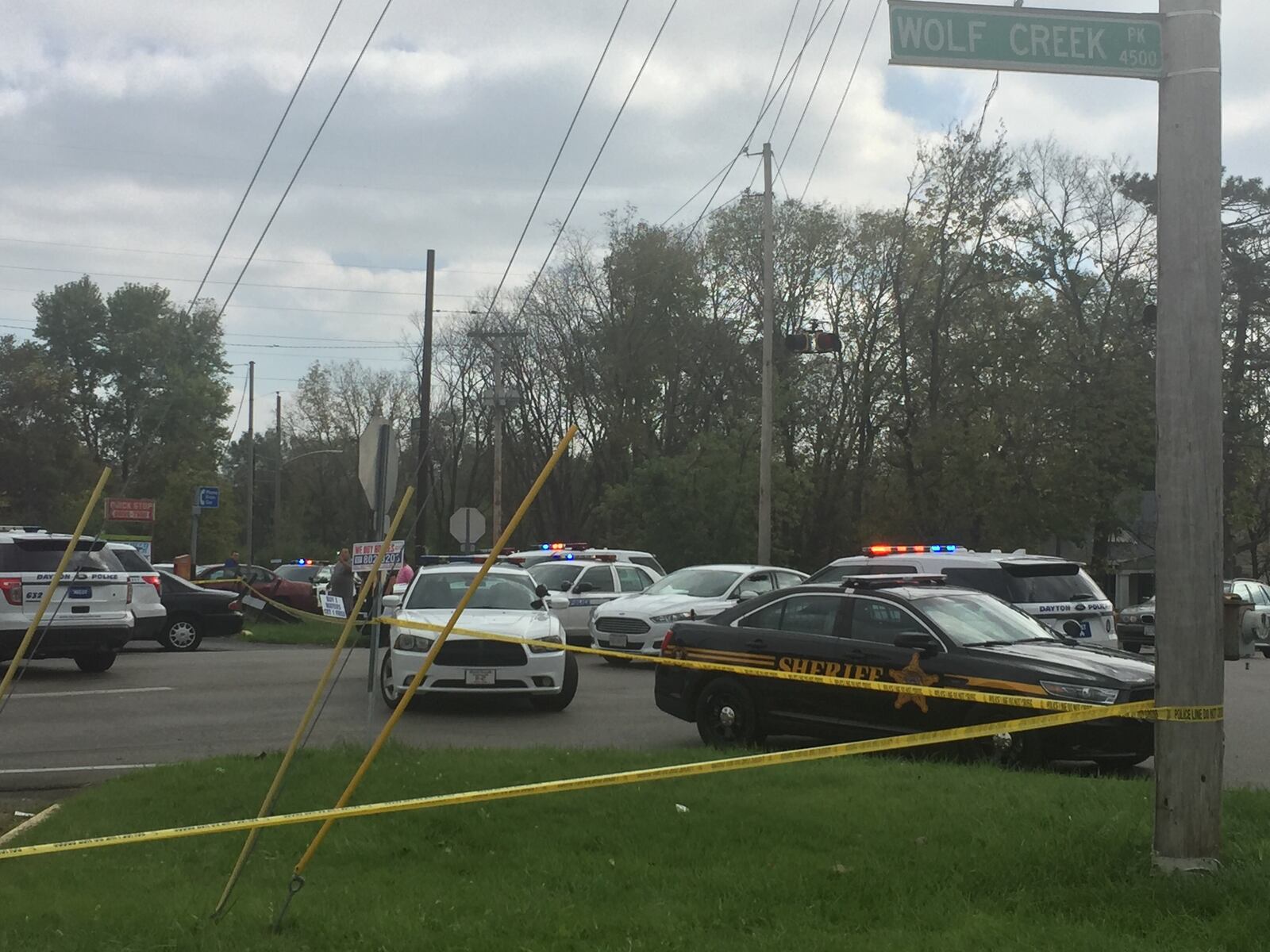 Man firing shots at officers from Trotwood house on Wolf Creek Pike. JAROD THRUSH/STAFF