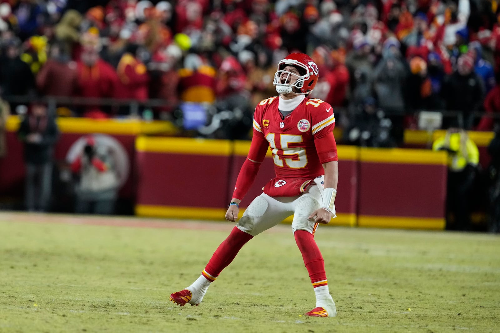 Kansas City Chiefs quarterback Patrick Mahomes (15) celebrates after defeating the Buffalo Bills in the AFC Championship NFL football game, Sunday, Jan. 26, 2025, in Kansas City, Mo. (AP Photo/Ed Zurga)