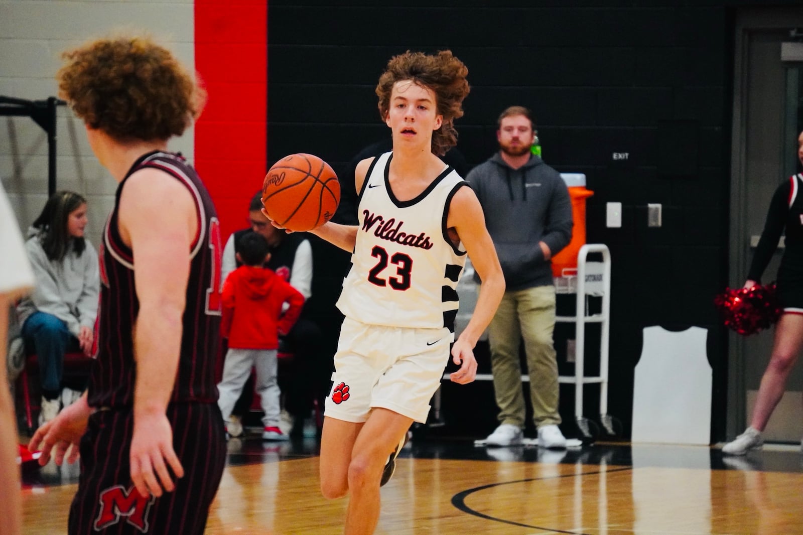 Franklin's Christian McGuire (23) dribbles the ball up court against Madison on Friday night. Chris Vogt/CONTRIBUTED