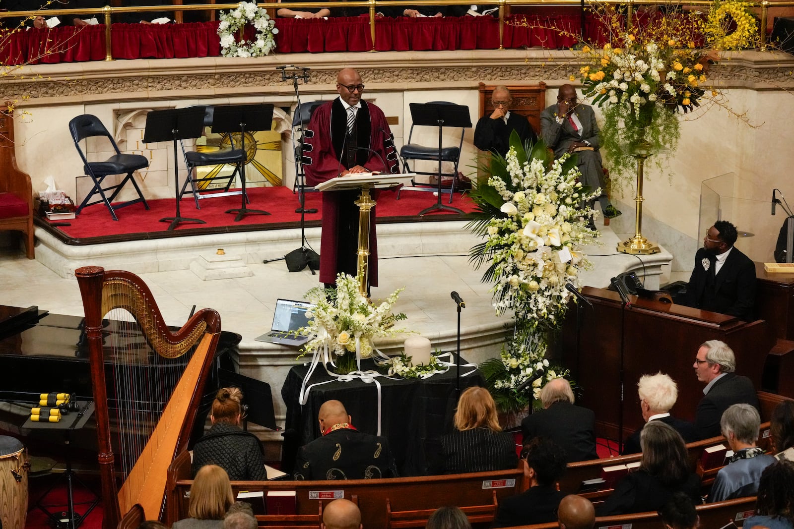 Senior Pastor of The Abyssinian Baptist Church, Reverend Dr. Kevin R. Johnson speaks during a ceremony in celebration of Roberta Flack's life at The Abyssinian Baptist Church on Monday, March 10, 2025, in New York. (AP Photo/Richard Drew)