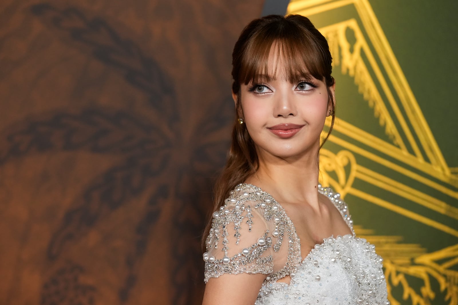 Lisa arrives at the season three premiere of "The White Lotus" on Monday, Feb. 10, 2025, at Paramount Theater in Los Angeles. (AP Photo/Chris Pizzello)