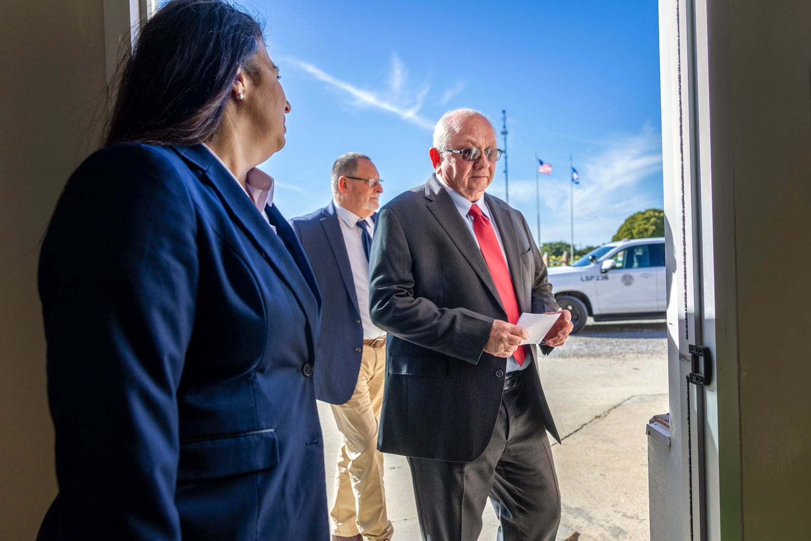 Darrel Vannoy, center, the warden of Louisiana State Penitentiary, walks into a room to announce that the execution of Jessie Hoffman Jr. is moving forward Tuesday, March 18, 2025, in Angola, La. Hoffman was convicted in the 1996 murder of Mary "Molly" Elliott. (Chris Granger/The Times-Picayune/The New Orleans Advocate via AP)