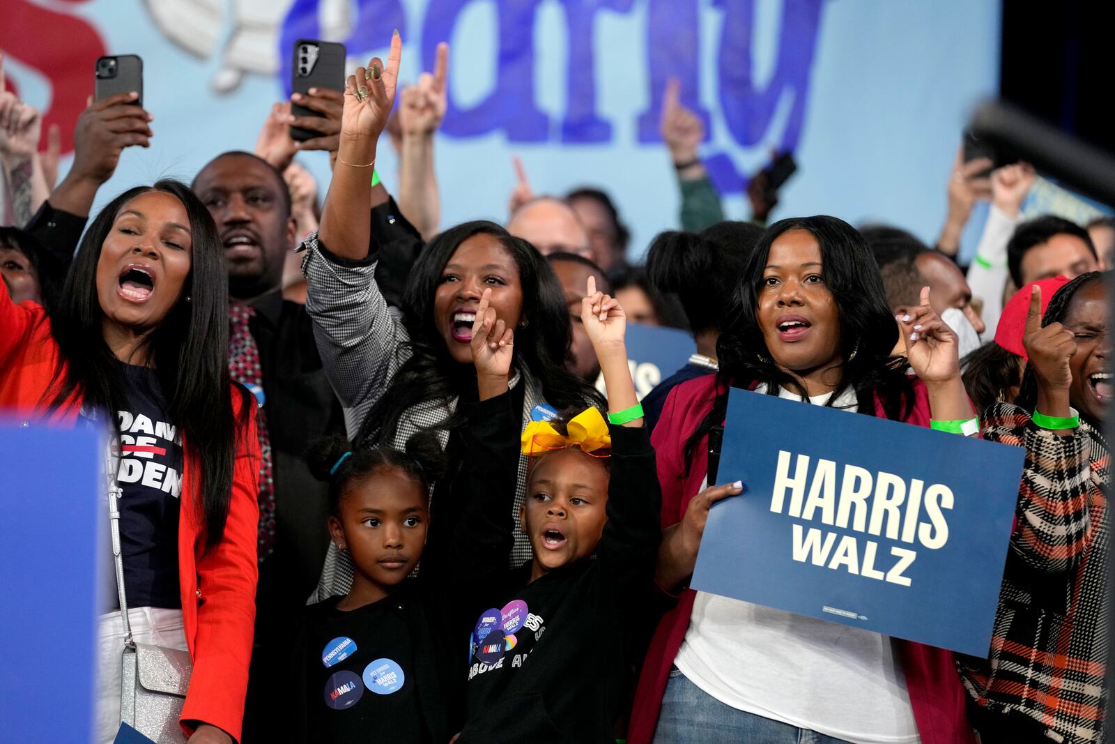 FILE - Supporters cheer during a community rally with Democratic presidential nominee Vice President Kamala Harris, Oct. 27, 2024, in Philadelphia. (AP Photo/Susan Walsh, File)