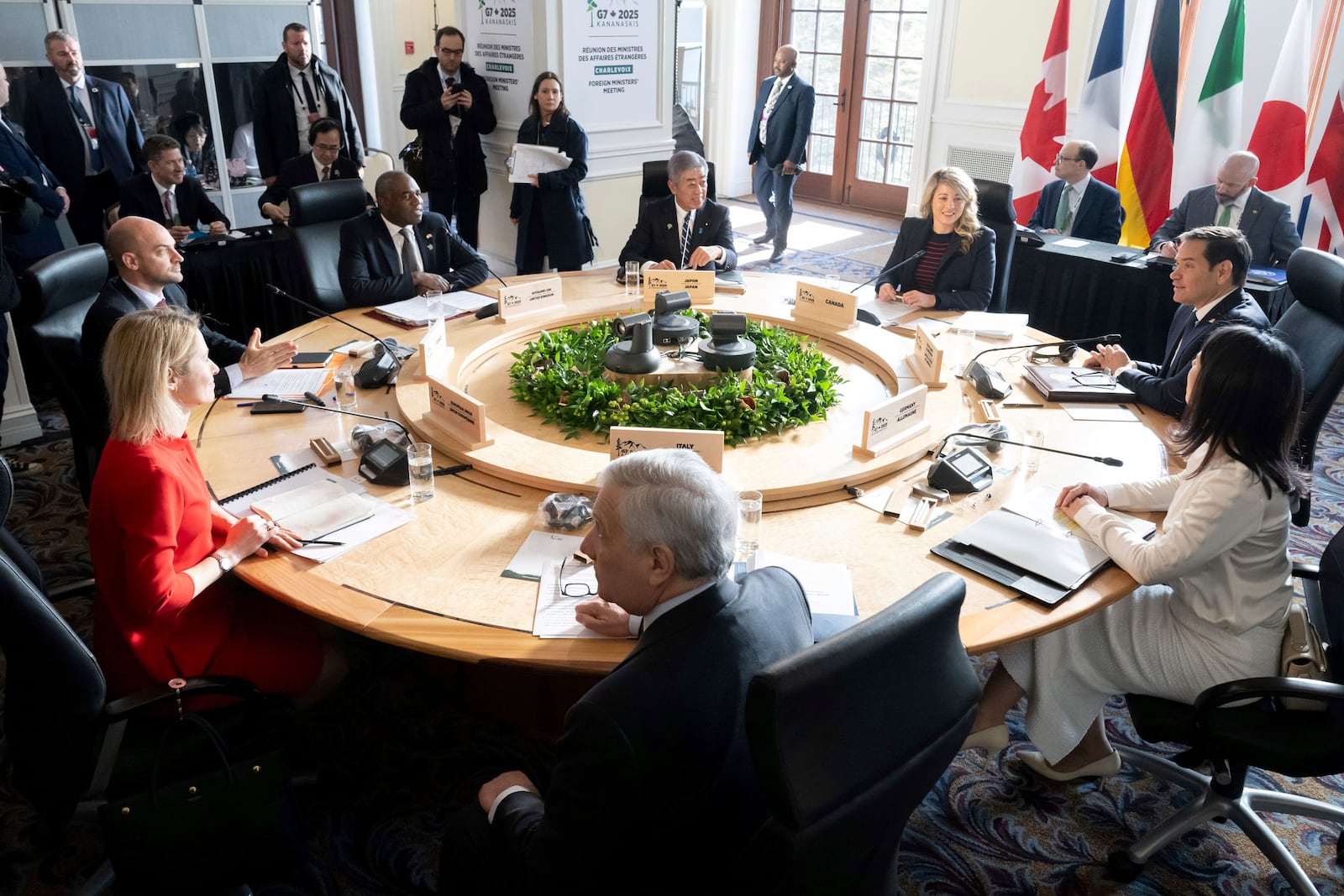 Canadian Foreign Minister Melanie Joly, center, right, speaks during the G7 foreign ministers meeting in La Malbaie, Quebec, Thursday, March 13, 2025. Alongside Joly are from left, European Union (EU) foreign policy chief Kaja Kallas, French Foreign Minister Jean-Noel Barrot, British Foreign Secretary David Lammy, Japanese Foreign Minister Iwaya Takeshi, U.S. Secretary of State Marco Rubio, German Foreign Minister Annalena Baerbock and Italian Foreign Minister Antonio Tajani. (Saul Loeb/Pool via AP)