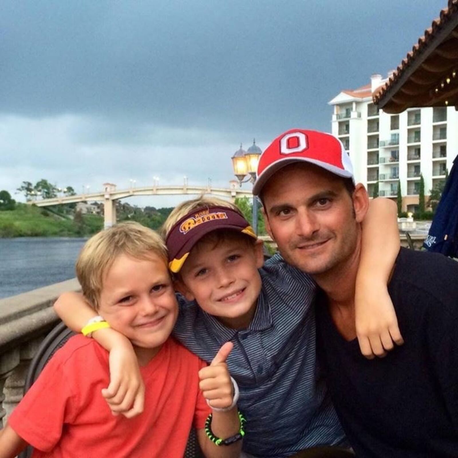 Cooper Burt, left, with his brother and his father, Joseph Burt. Cooper's dad died in 2015.