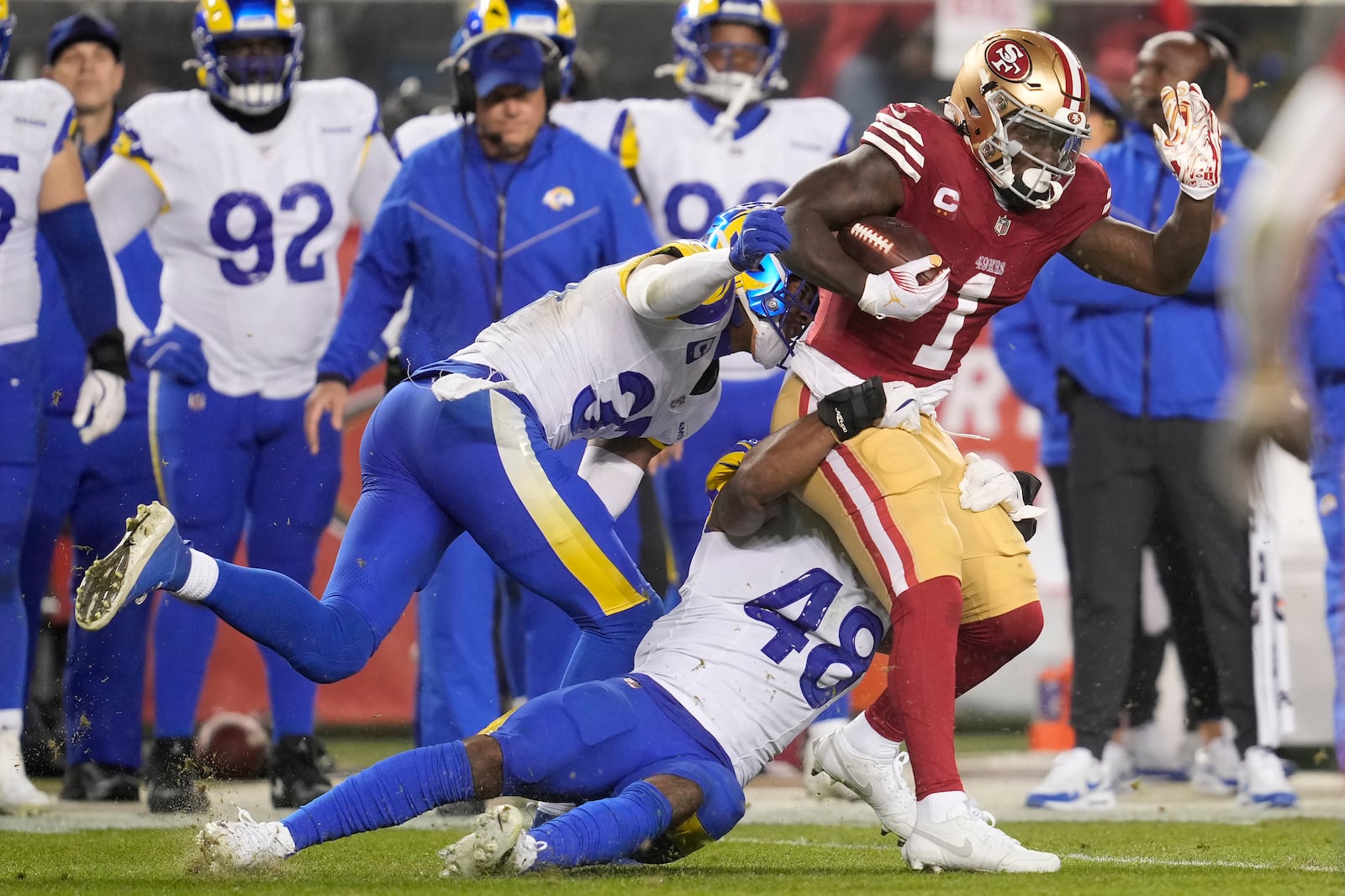 San Francisco 49ers wide receiver Deebo Samuel Sr. (1) runs against the Los Angeles Rams during the second half of an NFL football game in Santa Clara, Calif., Thursday, Dec. 12, 2024. (AP Photo/Godofredo A. Vásquez)