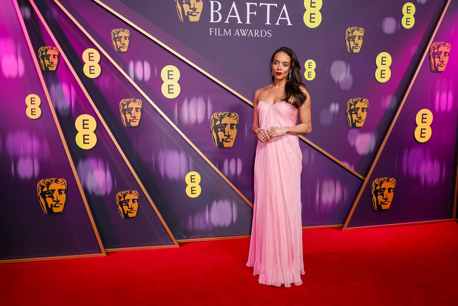 Hannah John-Kamen poses for photographers upon arrival at the 78th British Academy Film Awards, BAFTA's, in London, Sunday, Feb. 16, 2025. (Photo by Joel C Ryan/Invision/AP)