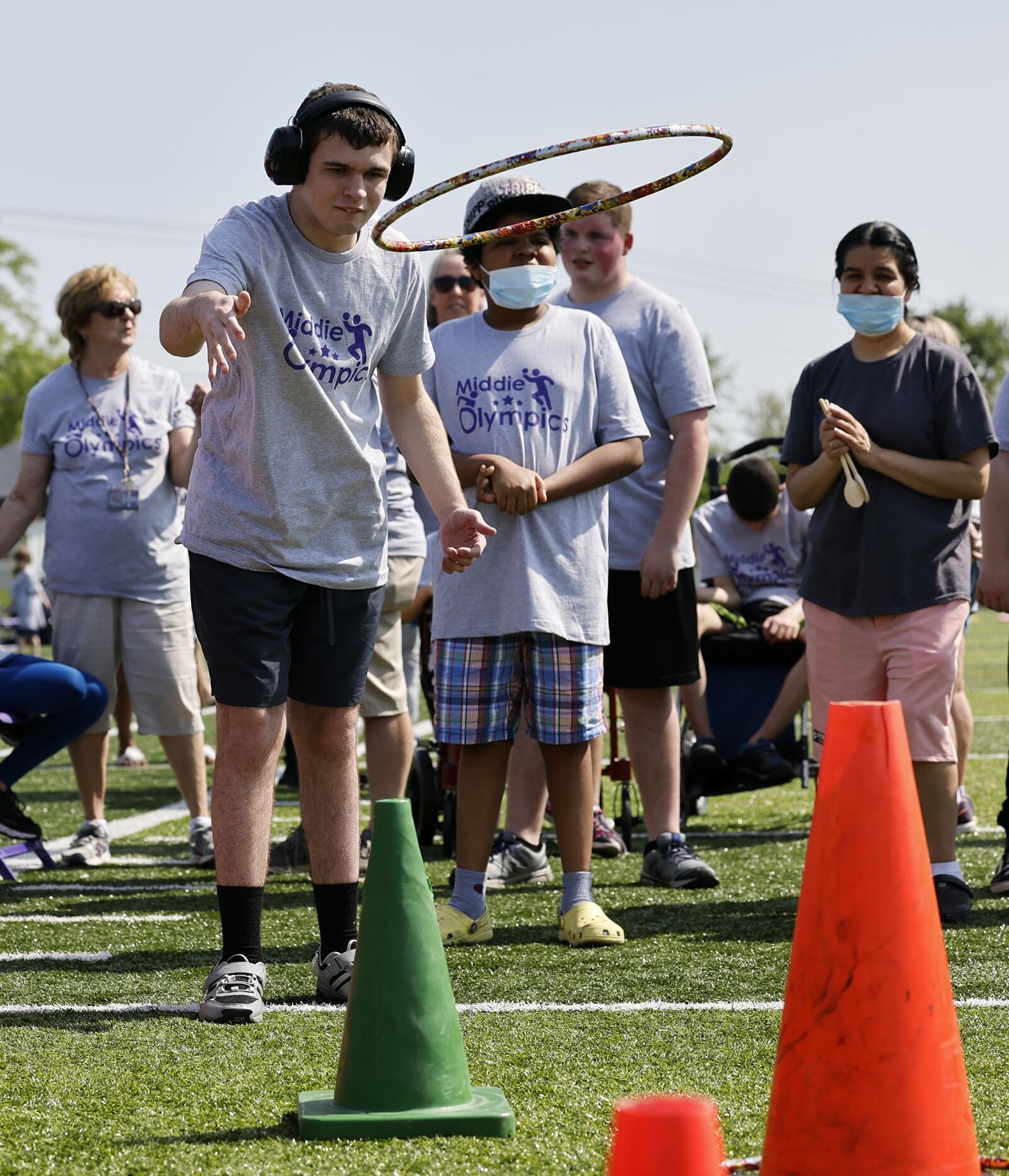 Steven Miller, 17, does the ring toss during the Middletown schools Middie Olympics day Thursday, May 12, 2022 at Middletown High School. Community and student volunteers helped and students from all Middletown schools participated. NICK GRAHAM/STAFF