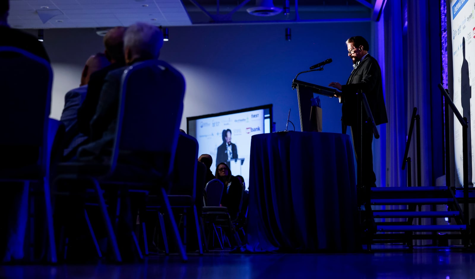 Dan Bates, President and CEO of Greater Hamilton Chamber of Commerce, speaks as hundreds gather for the annual Greater Hamilton Chamber of Commerce dinner Friday, Jan. 26, 2024 at Spooky Nook Sports Champion Mill in Hamilton. Taylor Stone-Welch was honored as Hamilton Citizen of the Year and Roland Lutz was honored as Small Business Person of the Year. NICK GRAHAM/STAFF