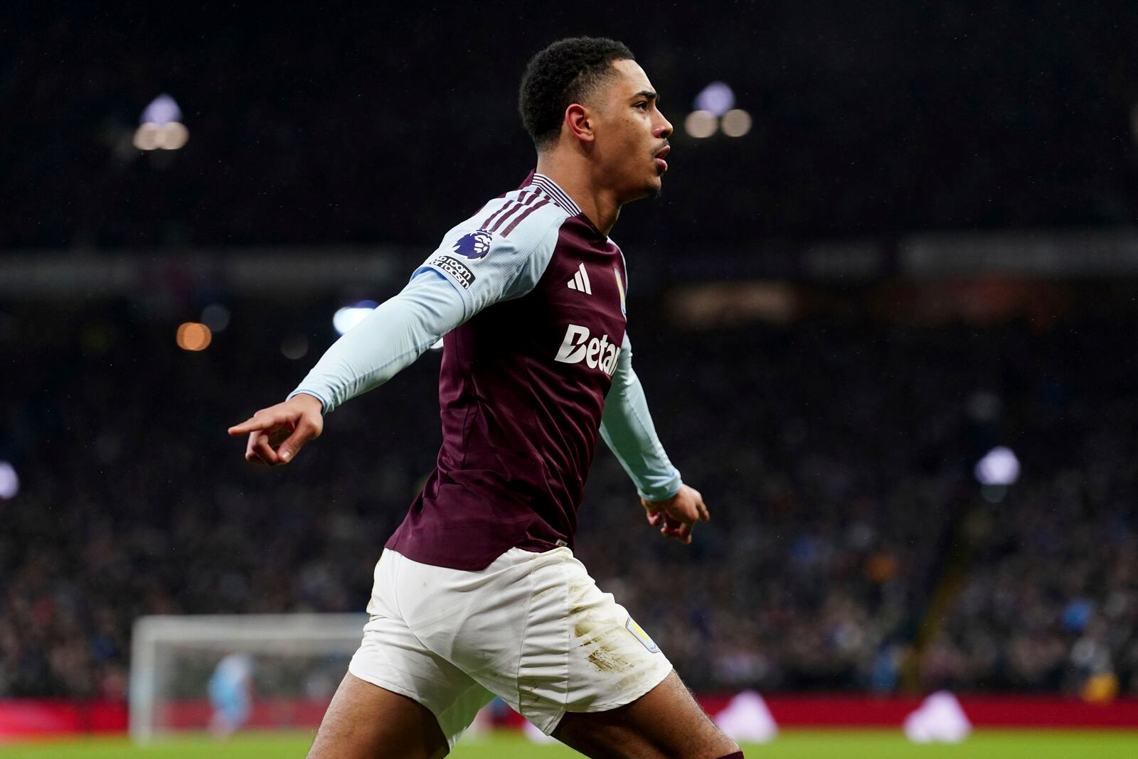 Aston Villa's Jacob Ramsey celebrates scoring their side's first goal of the game, during the English Premier League soccer match between Aston Villa and West Ham United at Villa Park, in Birmingham, England, Sunday, Jan. 26, 2025. (David Davies/PA via AP)