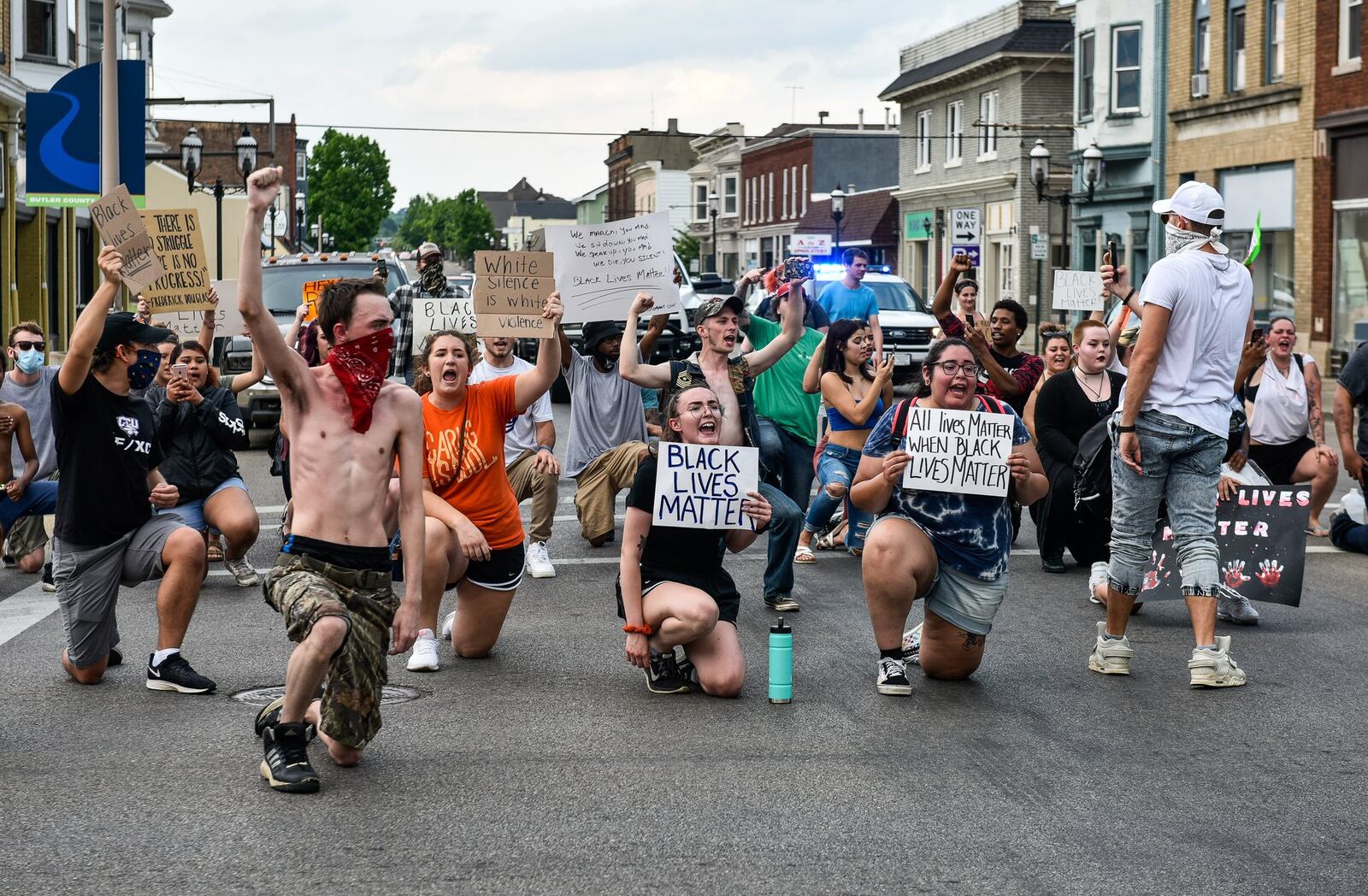 Over 75 people gathered at the city building for two different marches through downtown Middletown Wednesday, June 3, 2020. The groups gathered in response to the death of George Floyd in police custody in Minnesota. The crowd walked in the middle of Central Avenue on the way back to the city building while police blocked traffic. NICK GRAHAM / STAFF