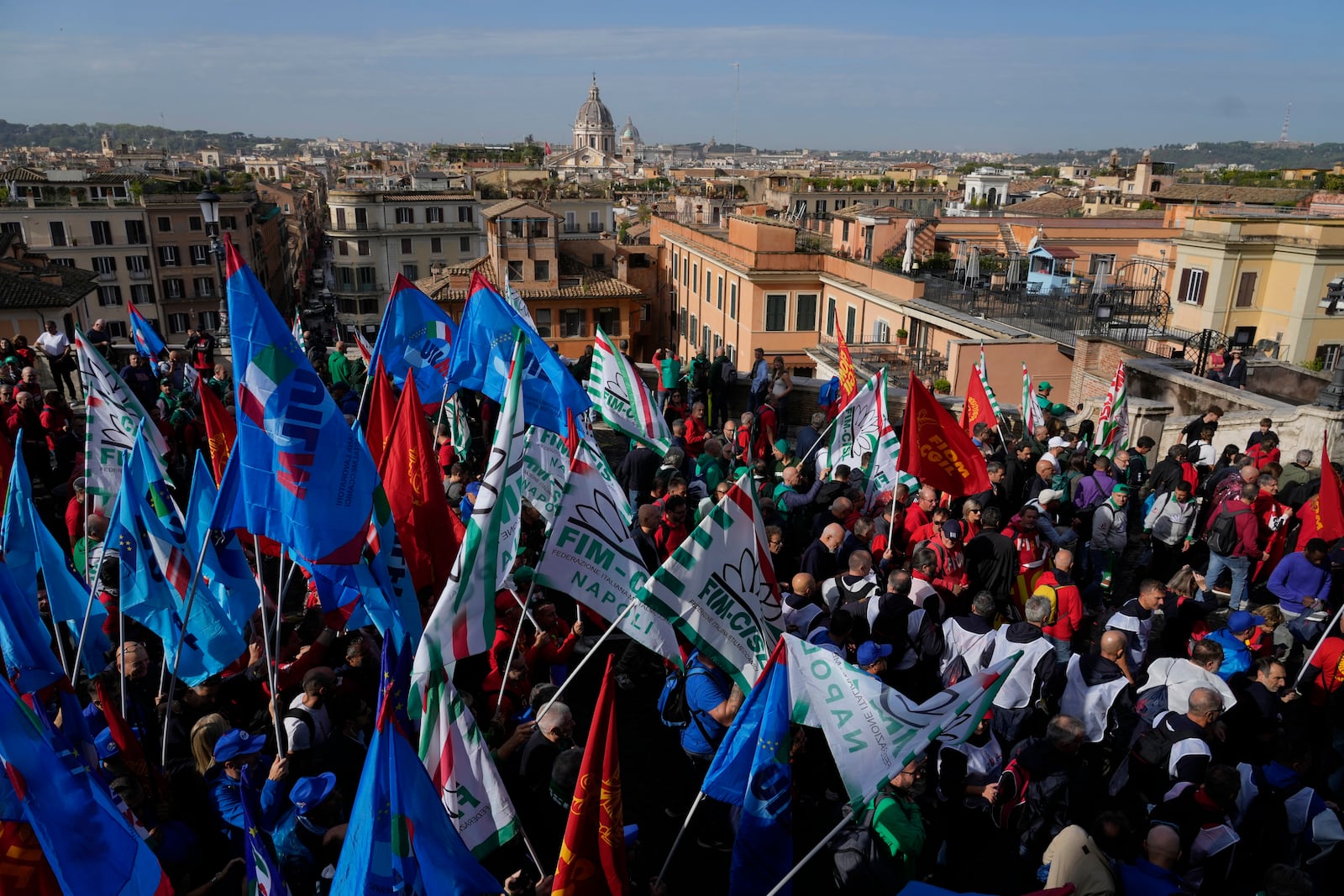 Workers of automotive sector march during a demonstration in Rome on the occasion of their national strike, Friday, Oct. 18, 2024. (AP Photo/Gregorio Borgia)