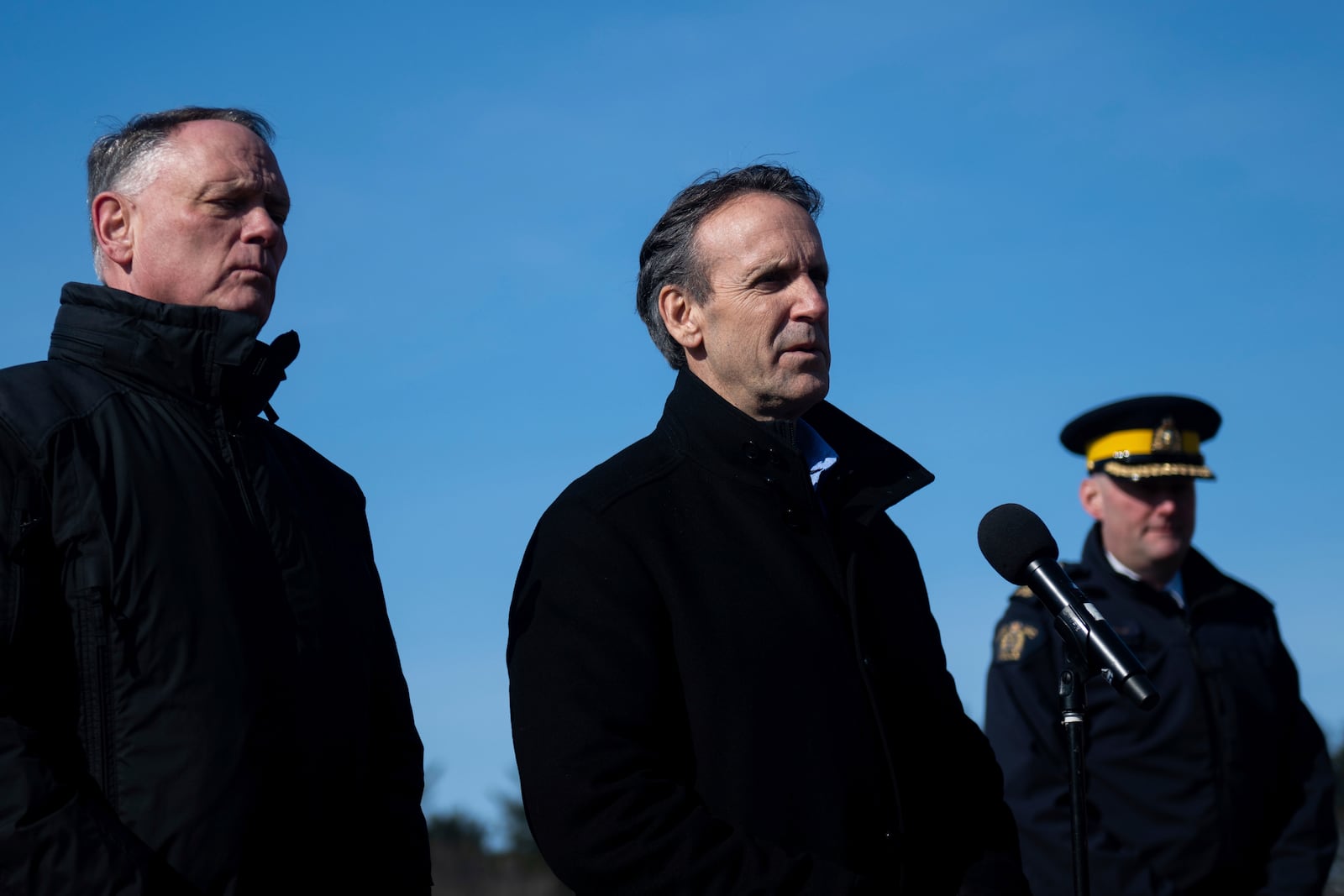 Canada's fentanyl czar Kevin Brosseau, center, speaks during a press conference following a tour of the Canada Border Services Agency Lansdowne port of entry in Lansdowne, Ontario, on Wednesday, Feb. 12, 2025. (Spencer Colby/The Canadian Press via AP)