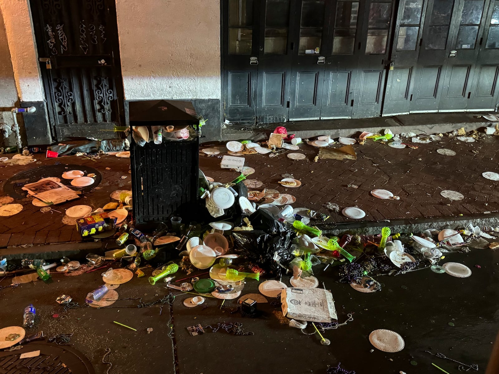 Trash lies scattered after the Mardi Gras celebrations in the French Quarter in New Orleans, on Ash Wednesday, March 5, 2025. (AP Photo/Jack Brook)