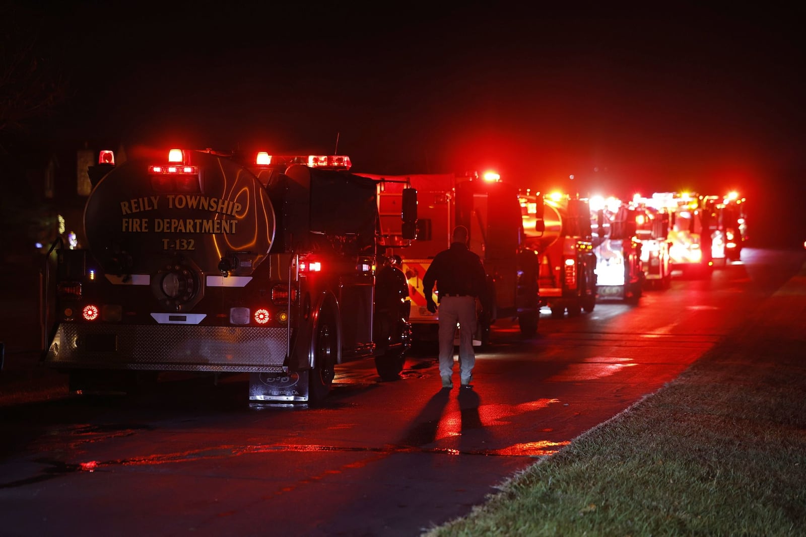 Many neighboring fire department assisted Ross Twp. Fire Department with a large residential fire Tuesday night on Red Wing Court. NICK GRAHAM/STAFF