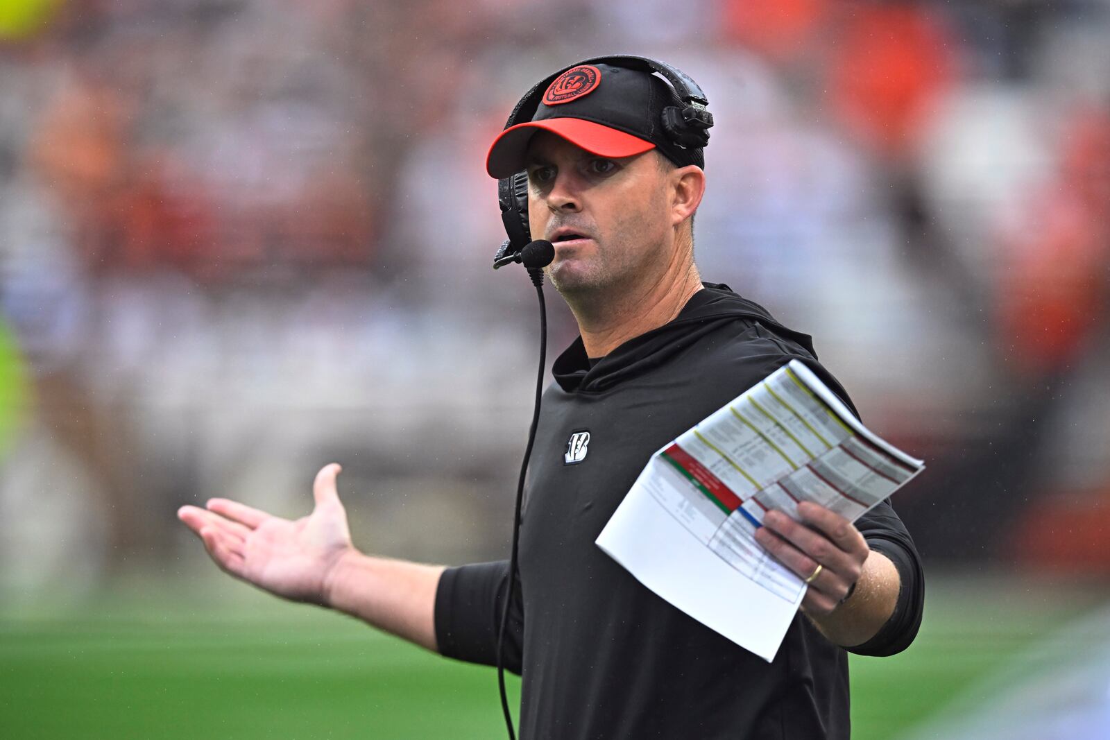 Cincinnati Bengals head coach Zac Taylor questions a call during the first half of an NFL football game against the Cleveland Browns Sunday, Sept. 10, 2023, in Cleveland. (AP Photo/David Richard)