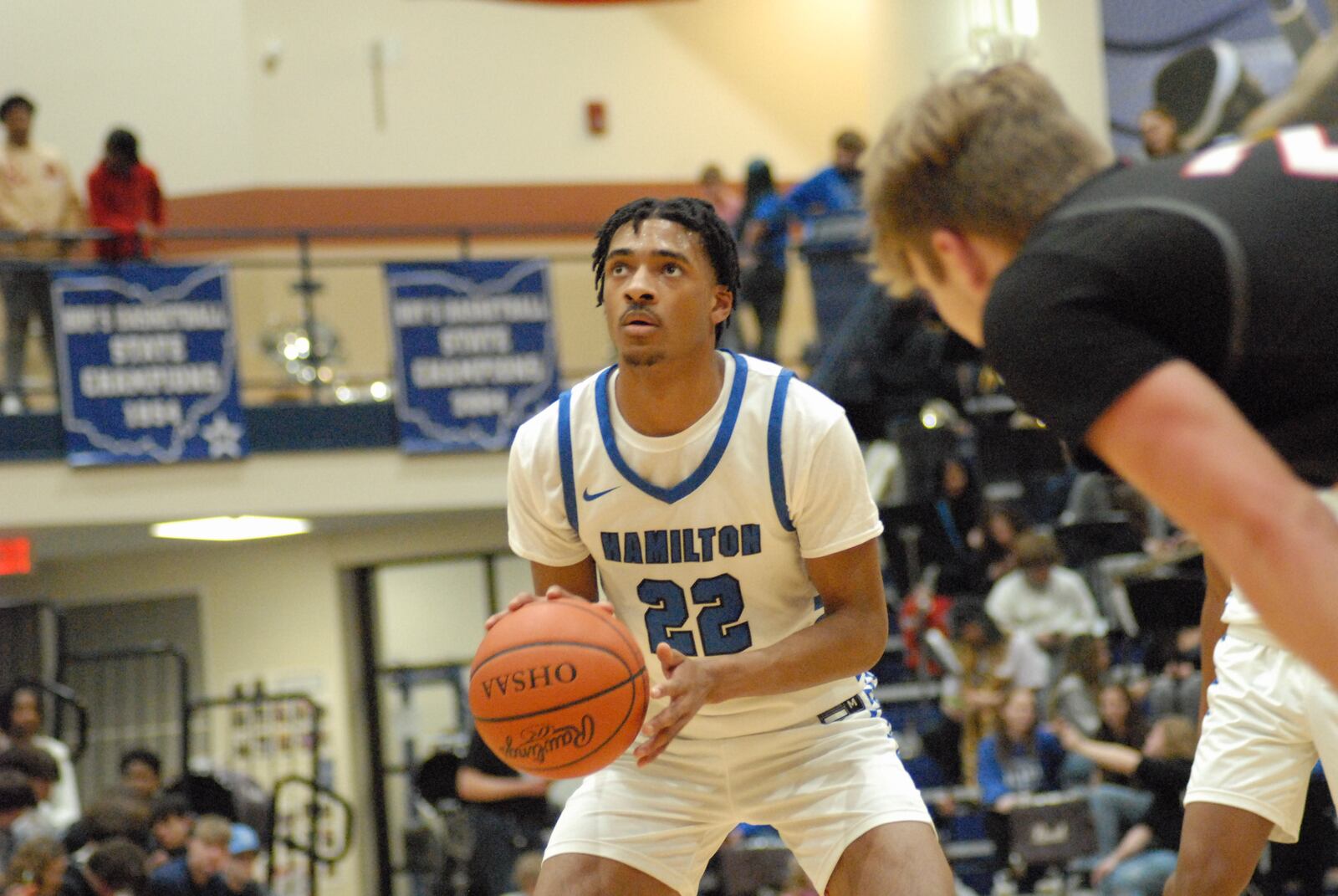 Hamilton senior Demetrius Berry (22) eyes the hoop during a free-throw attempt against Lakota West on Friday night. Chris Vogt/CONTRIBUTED