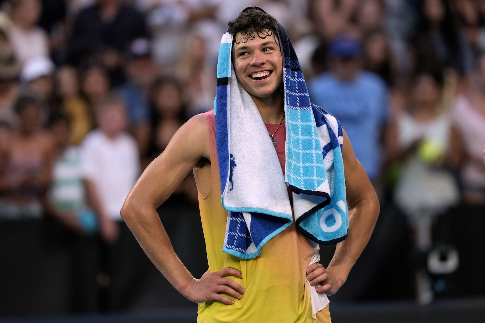 Ben Shelton of the U.S. reacts after defeating Lorenzo Musetti of Italy in their third round match at the Australian Open tennis championship in Melbourne, Australia, Saturday, Jan. 18, 2025. (AP Photo/Ng Han Guan)