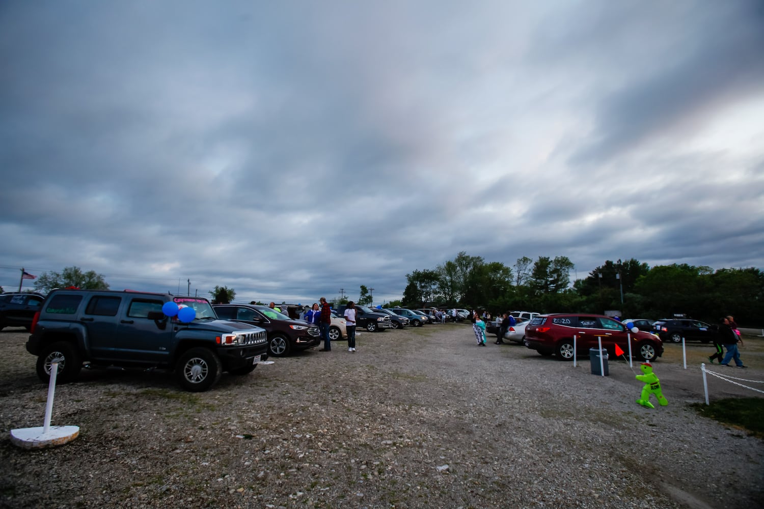 Hamilton High School seniors celebrate graduation at Holiday Auto Theatre drive-in