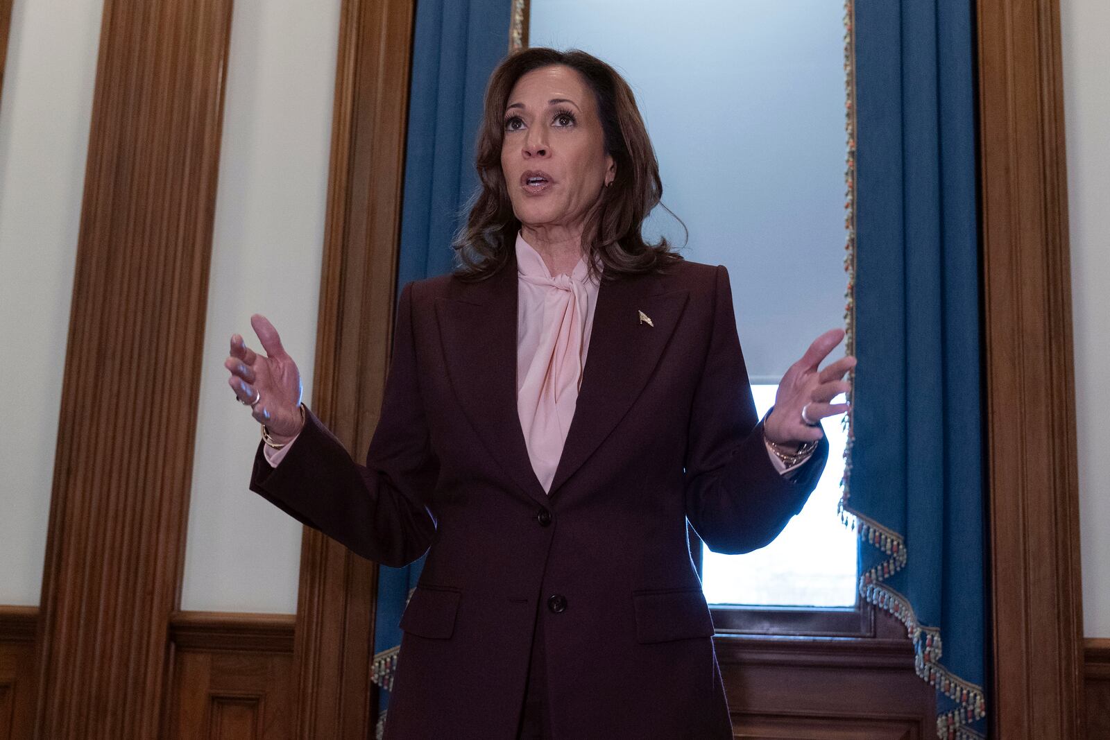 Vice President Kamala Harris talks to reporters after presiding over a joint session of Congress to confirm the Electoral College votes at the Capitol, Monday, Jan. 6, 2025, in Washington. (AP Photo/Jose Luis Magana)