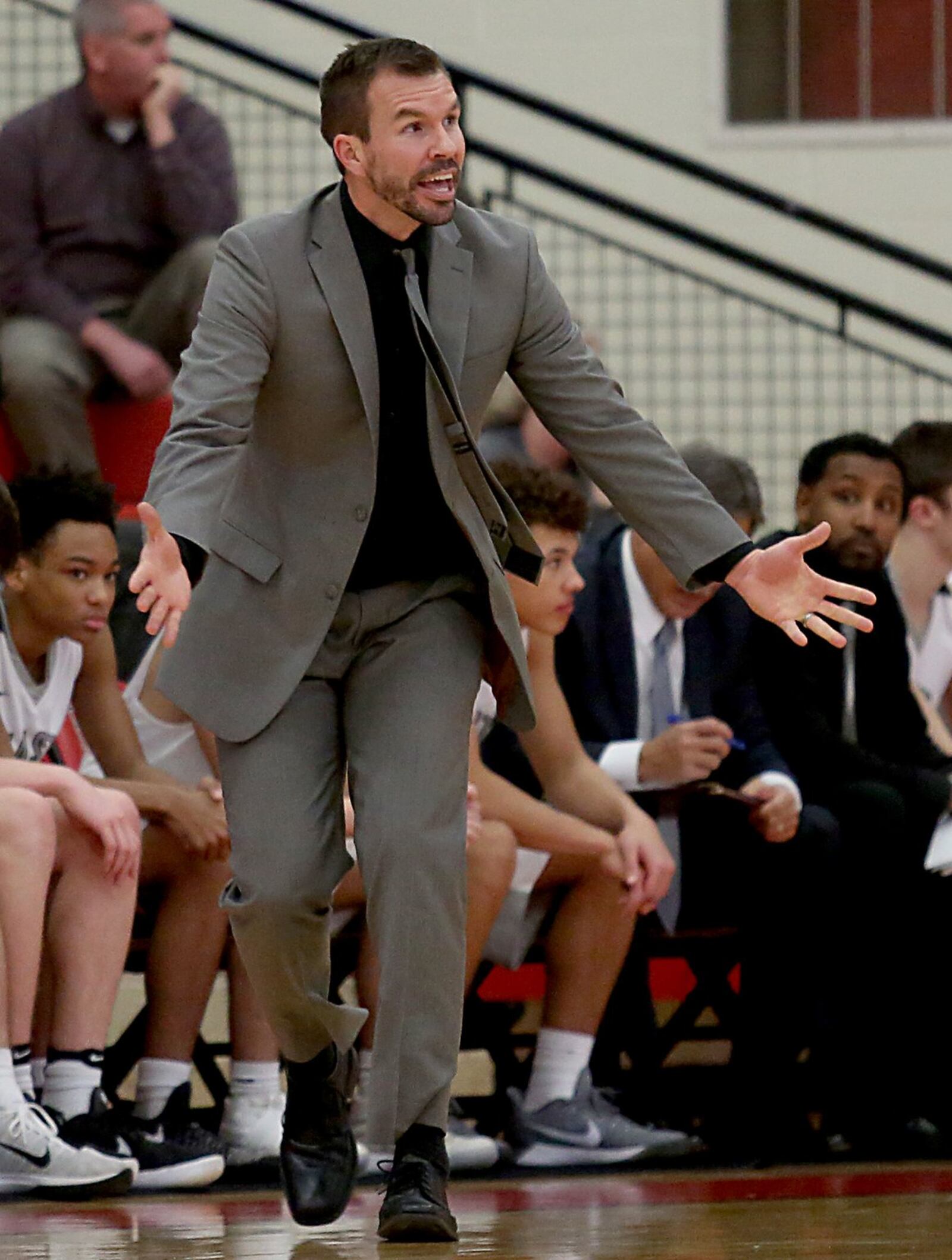 Lakota East coach Clint Adkins works the sideline Wednesday night during a Division I sectional contest against Kings at Lakota West. CONTRIBUTED PHOTO BY E.L. HUBBARD