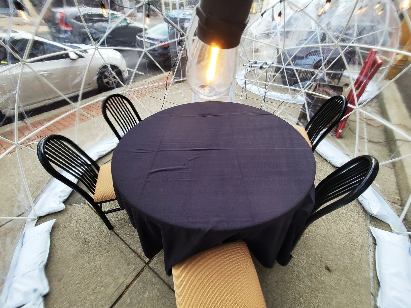 Basil 1791 on High Street in Hamilton has installed igloos for outdoor dining on the sidewalk in front of the restaurant. NICK GRAHAM / STAFF