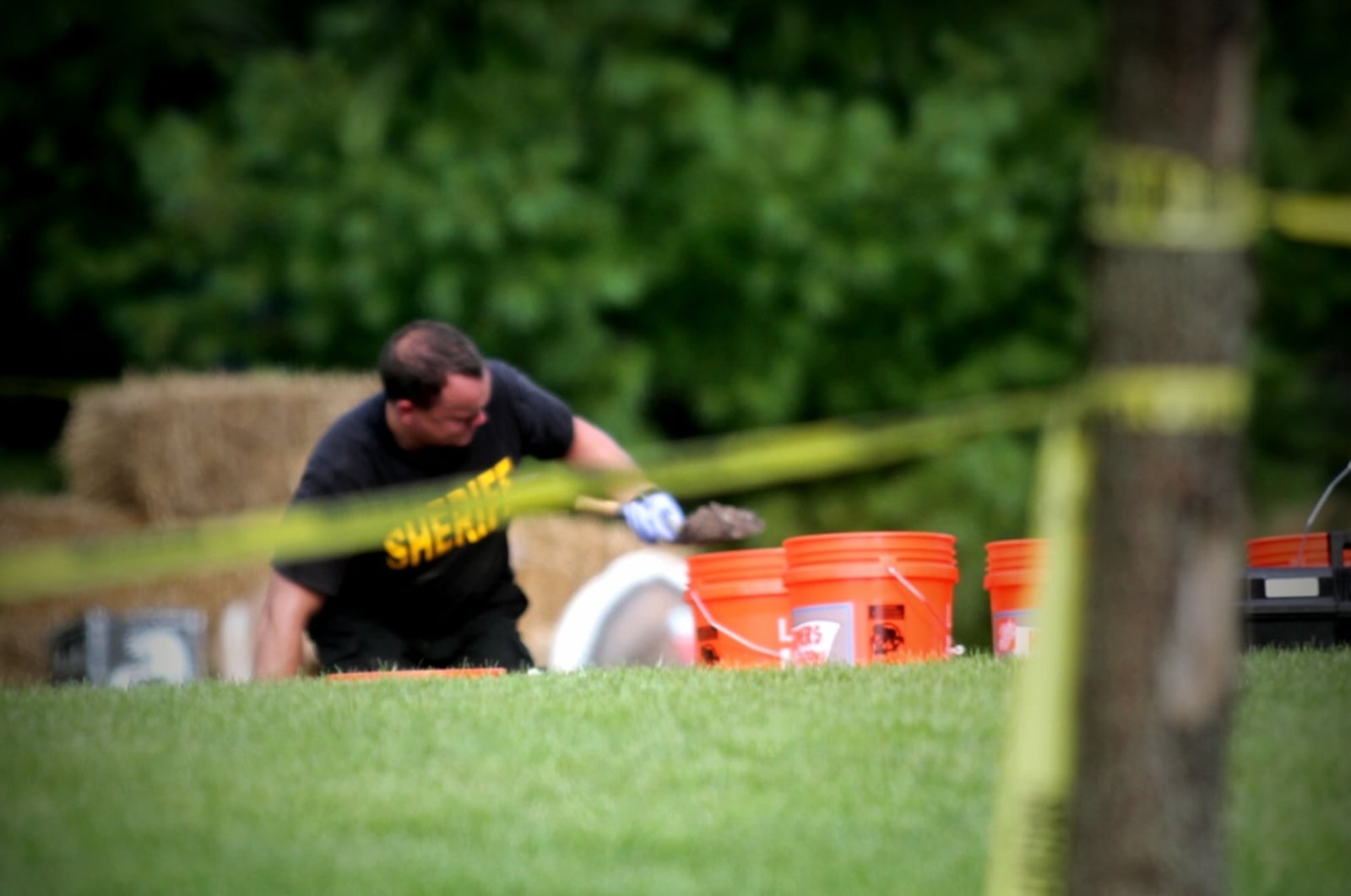 Warren County  search for potential evidence at the Carlisle home where on July 14 they found remains of an infant buried in the backyard. 