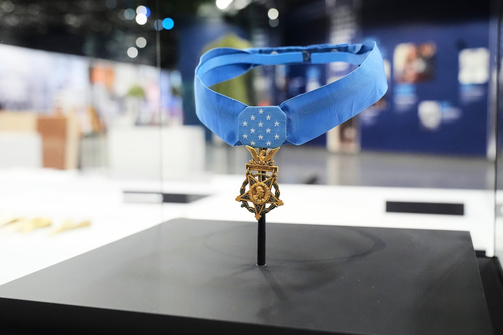 A Medal of Honor is on display at the National Medal of Honor Museum in Arlington, Texas, Thursday, March 13, 2025. (AP Photo/Tony Gutierrez)