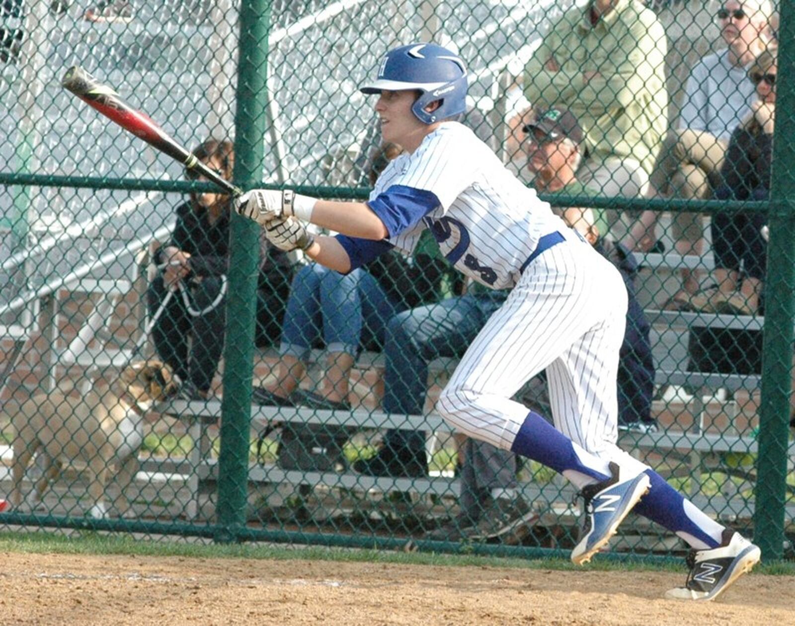 Hamilton’s Jackson Lewis (3) takes a cut and heads toward first base April 18 during a Greater Miami Conference baseball game against Mason at Hamilton. Mason won 16-8. RICK CASSANO/STAFF