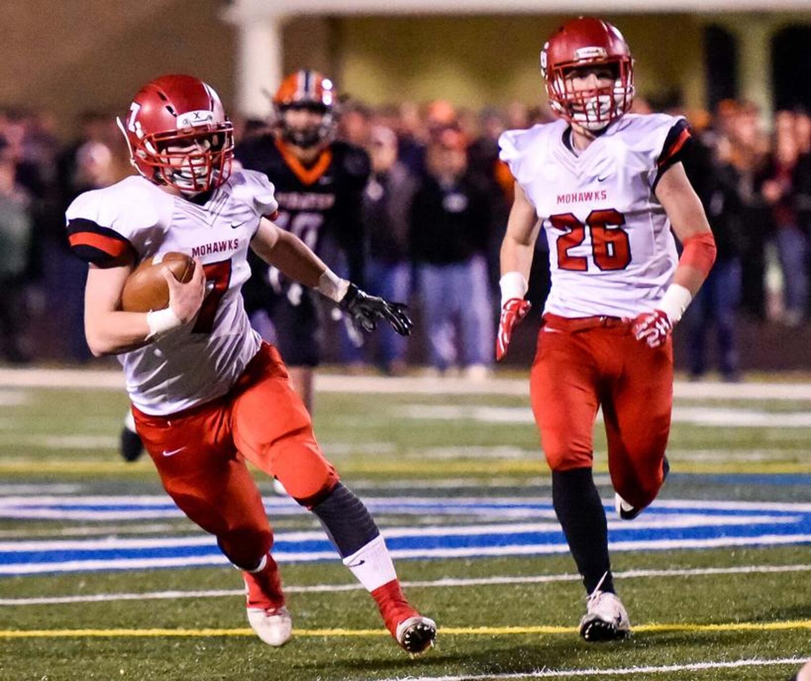 Madison’s Mason Whiteman scrambles for yardage during a Division V state semifinal against Wheelersburg on Nov. 24, 2017, at Herrnstein Field in Chillicothe. Wheelersburg came from behind to win 15-10. NICK GRAHAM/STAFF