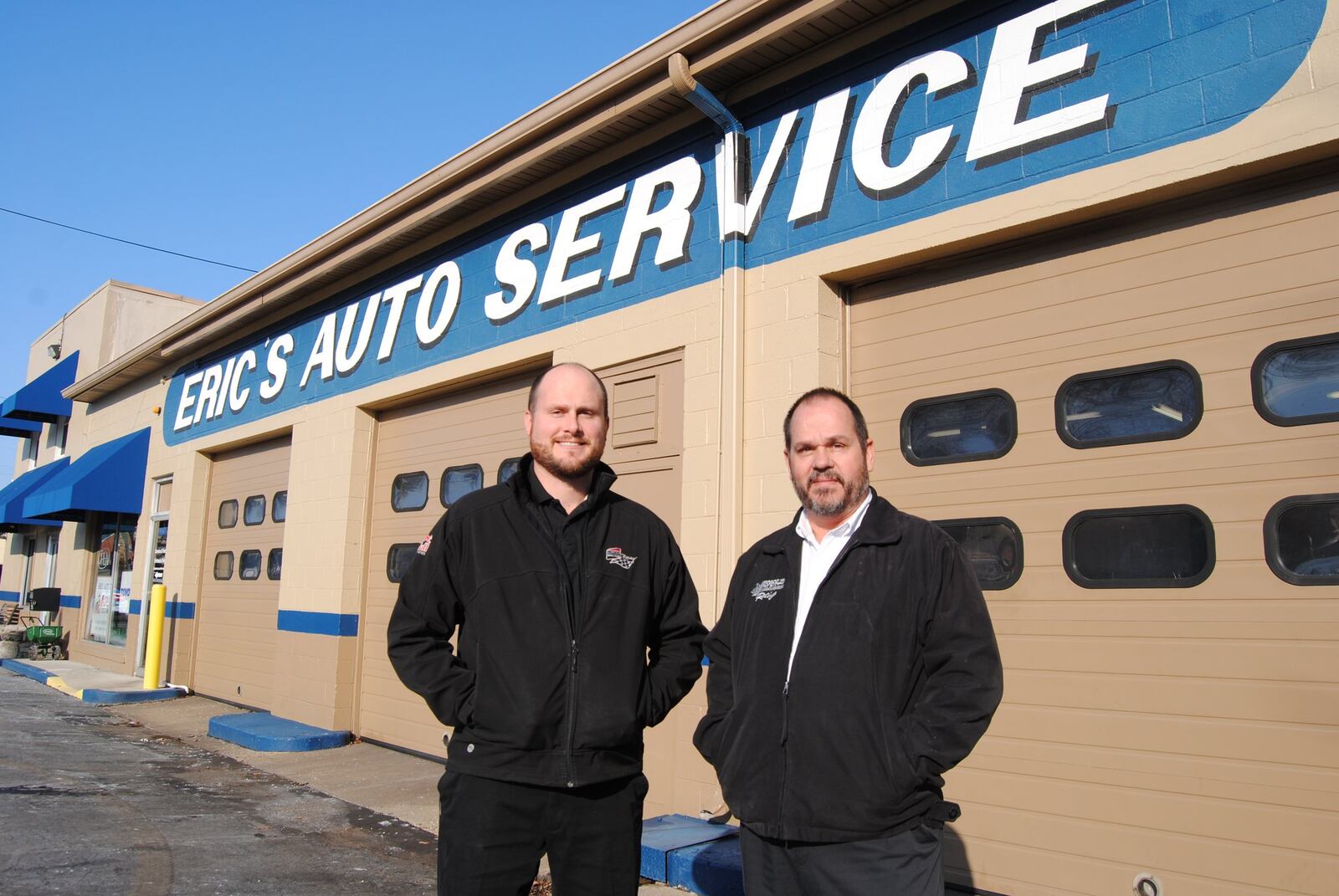 Eric Pohlman (right) recently sold Eric’s Auto & Tire Service in Hamilton to his nephew, Ryan Pohlman (left). The business got its start in 1996 on the city’s West Side, a little more than a mile from Main Street. ERIC SCHWARTZBERG/STAFF