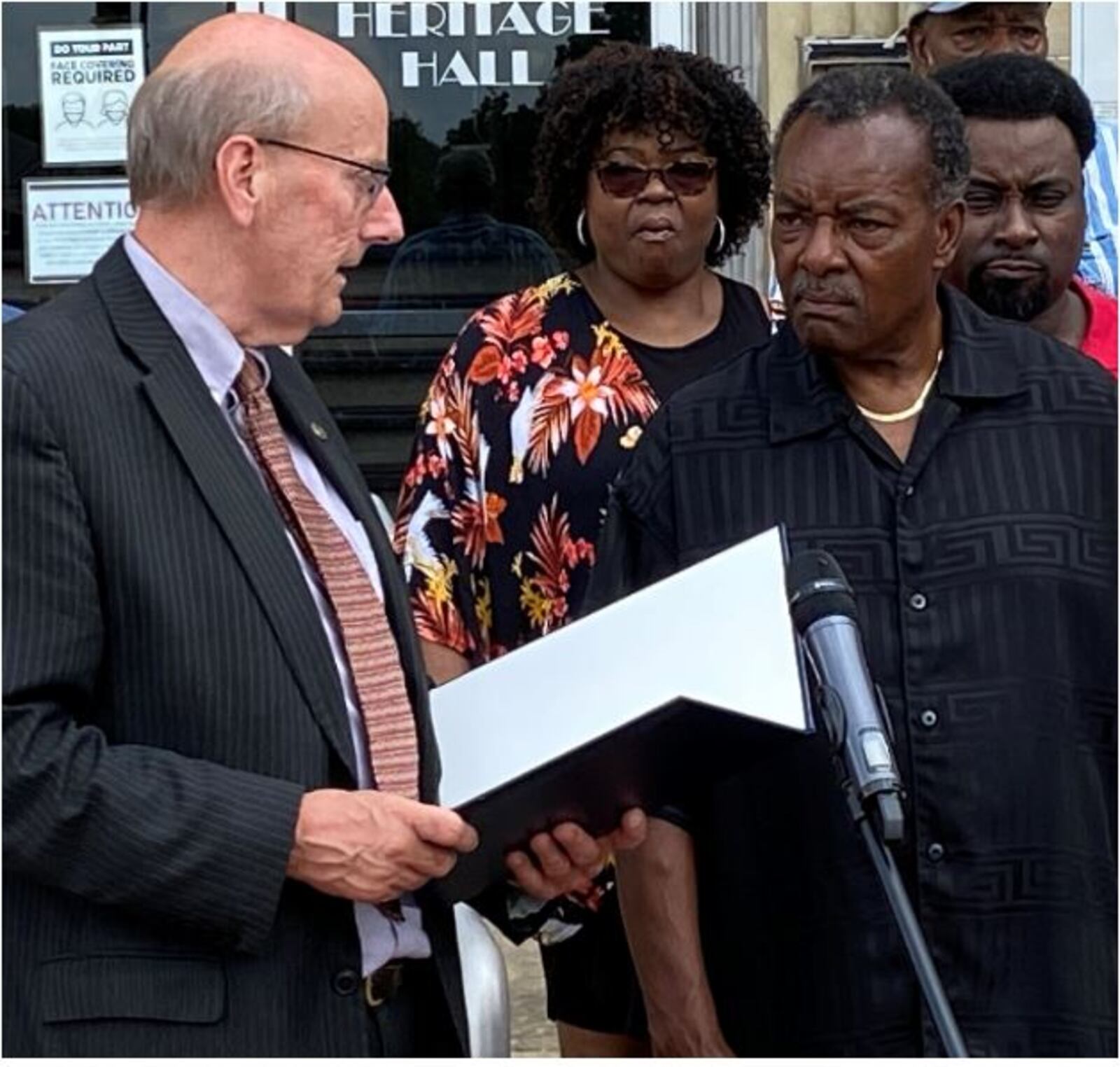 Mayor Pat Moeller (left) honored Arthur Singletary with a proclamation, thanking him for helping the people of Hamilton during struggling times. CONTRIBUTED