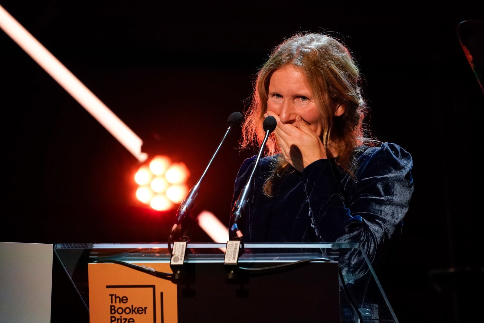 Samantha Harvey gives a speech after winning the Booker Prize award 2024, in London, Tuesday, Nov. 12, 2024. (AP Photo/Alberto Pezzali)