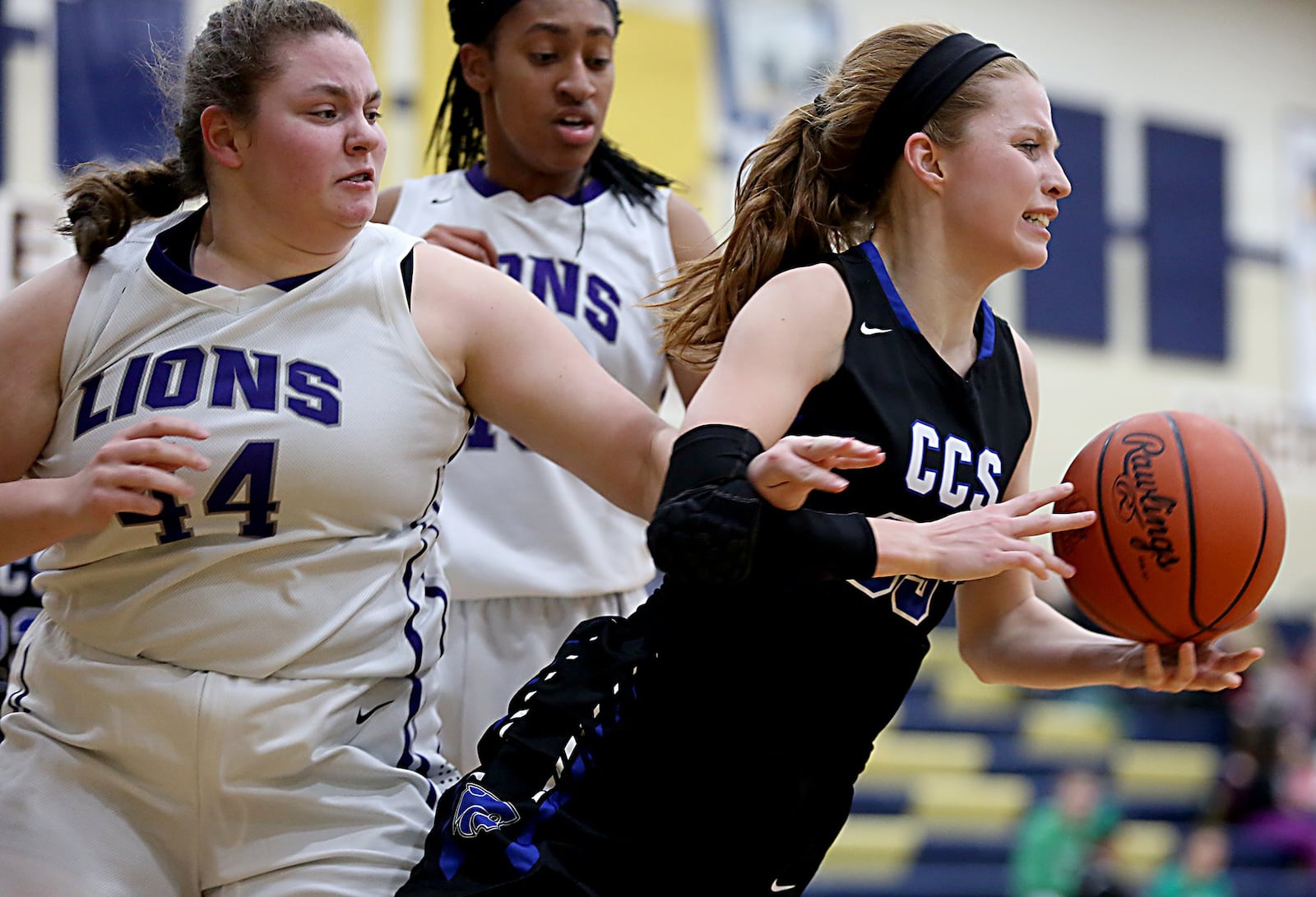 Cincinnati Christian guard Allie Statzer falls after getting tangled up with Miami Valley Christian Academy center Dawsyn Vilardo during their Division IV sectional game at Monroe on Tuesday night. CONTRIBUTED PHOTO BY E.L. HUBBARD