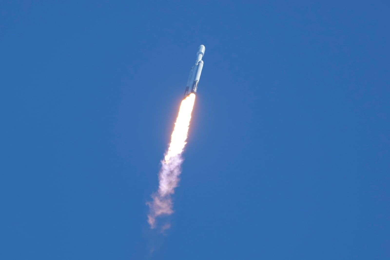 A SpaceX Falcon Heavy rocket with a NASA spacecraft bound for Jupiter lifts off from pad 39A at the Kennedy Space Center Monday, Oct. 14, 2024 in Cape Canaveral, Fla. (AP Photo/John Raoux)