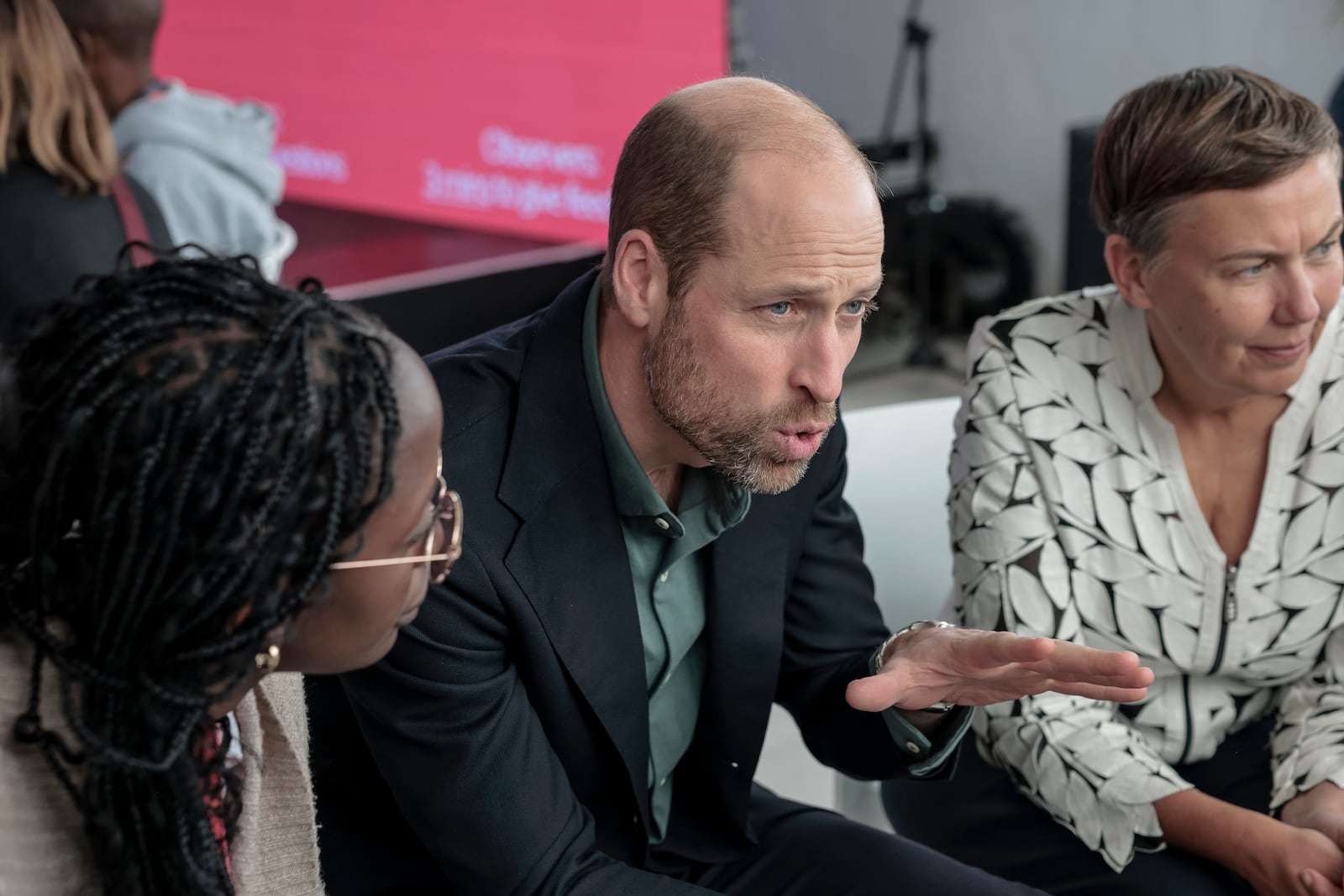 Britain's Prince William talks to a group of young people at the Earthshot Prize Climate Leaders Youth Programme at Rooftop on Bree in Cape Town, South Africa, Monday Nov. 4, 2024. (Gianluigi Guercia/Pool Photo via AP)