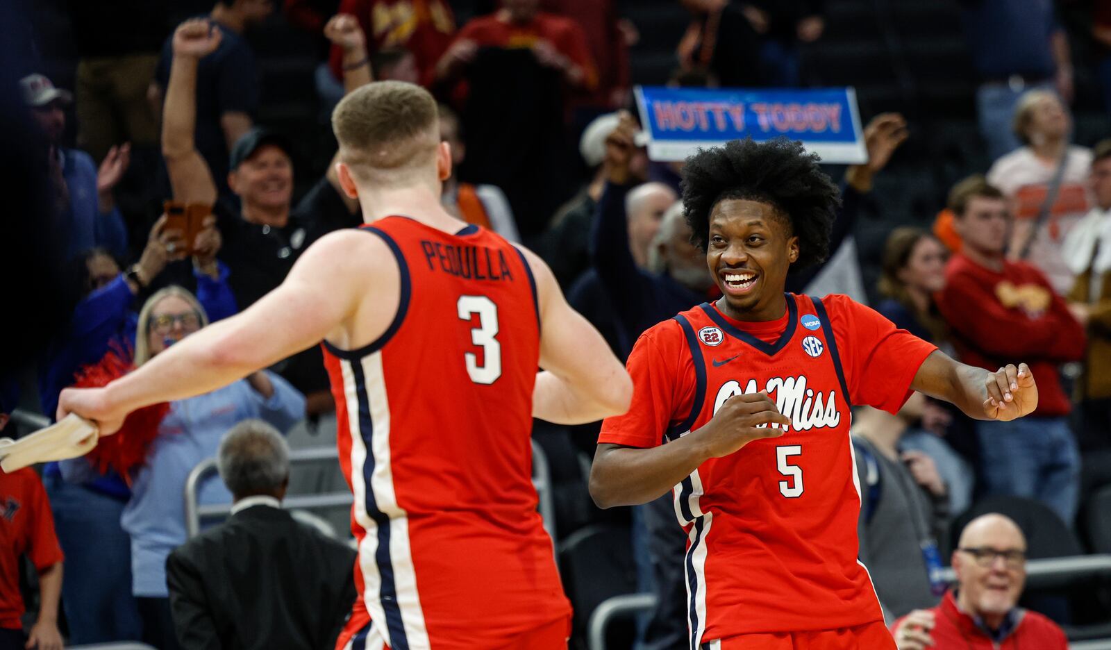 Mississippi guard Sean Pedulla (3) reacts with guard Jaylen Murray (5) against Iowa State during the second half in the second round of the NCAA college basketball tournament Sunday, March 23, 2025, in Milwaukee. (AP Photo/Jeffrey Phelps)