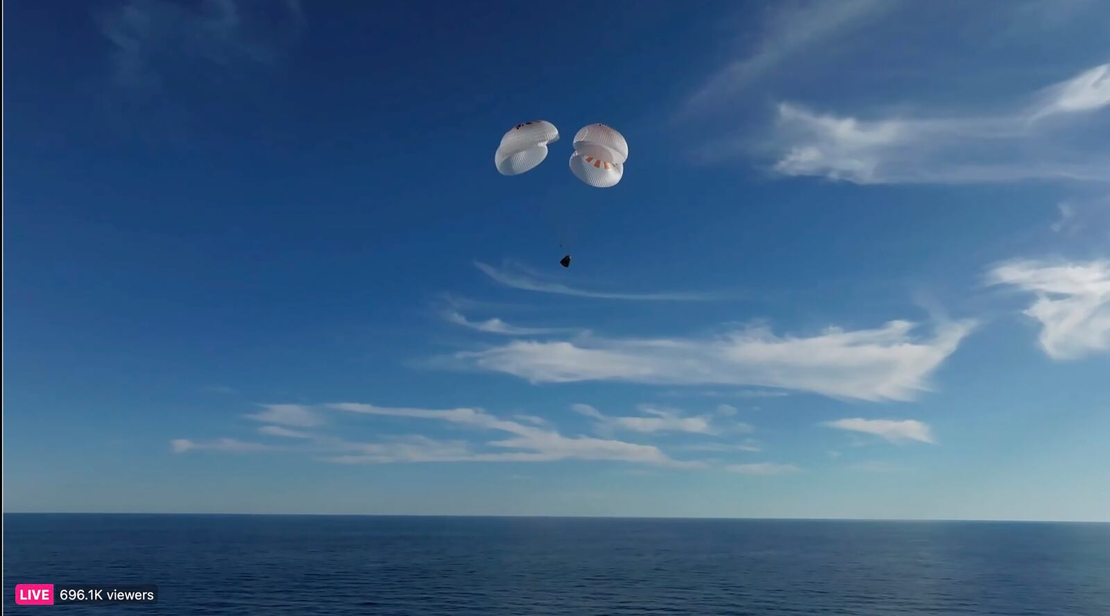 This image taken from video released by SpaceX shows a SpaceX capsule parachuting into the Gulf of Mexico, Tuesday, March 18, 2025. (SpaceX via AP)