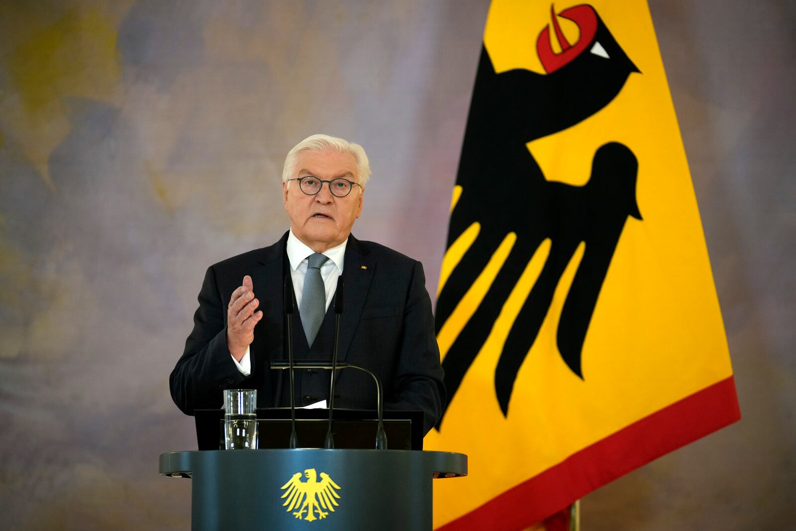 German President Frank-Walter Steinmeier announces the decision to dissolve the German Bundestag and schedule a new election for February 23 next year, in Berlin, Friday, Dec. 27, 2024. (AP Photo/Ebrahim Noroozi)