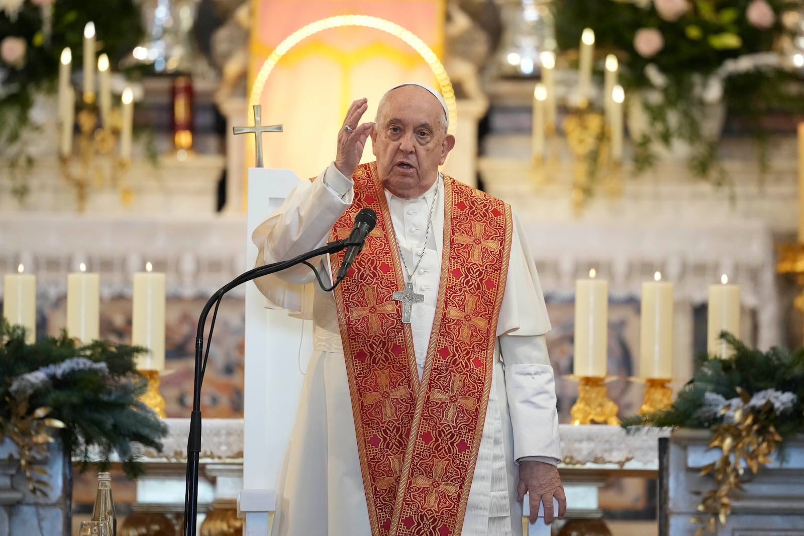 Pope Francis delivers the Angelus prayer inside the Cathedral of Our Lady of the Assumption of Ajaccio on the occasion of his one-day visit in the French island of Corsica, Sunday, Dec. 15, 2024. (AP Photo/Alessandra Tarantino)