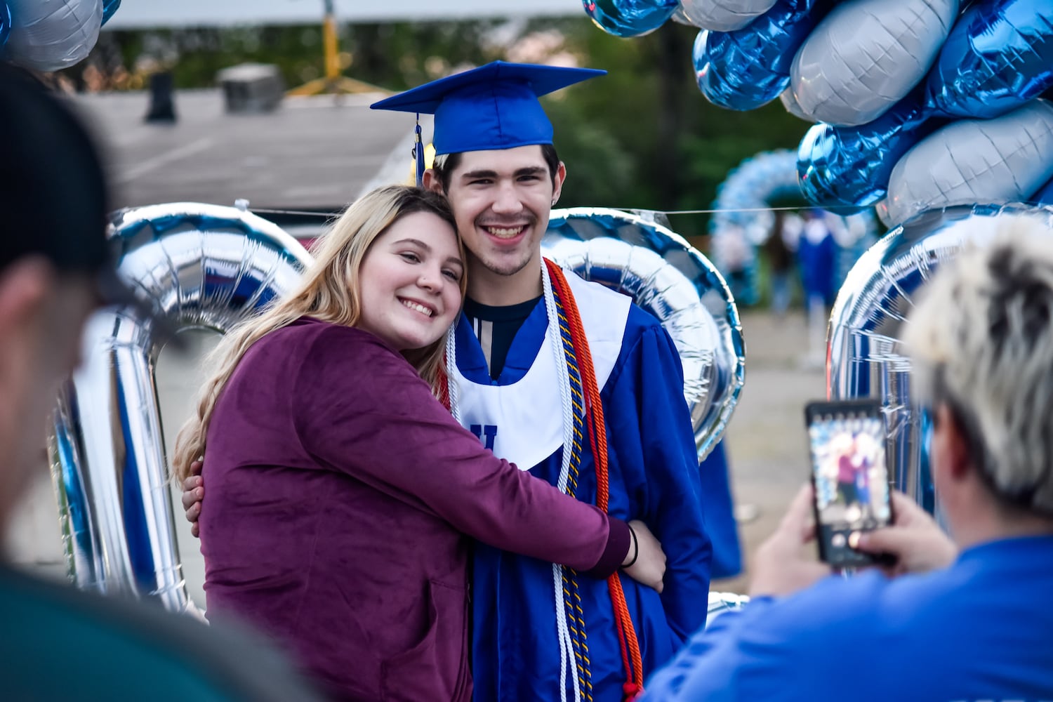 Hamilton High School seniors celebrate graduation at Holiday Auto Theatre drive-in